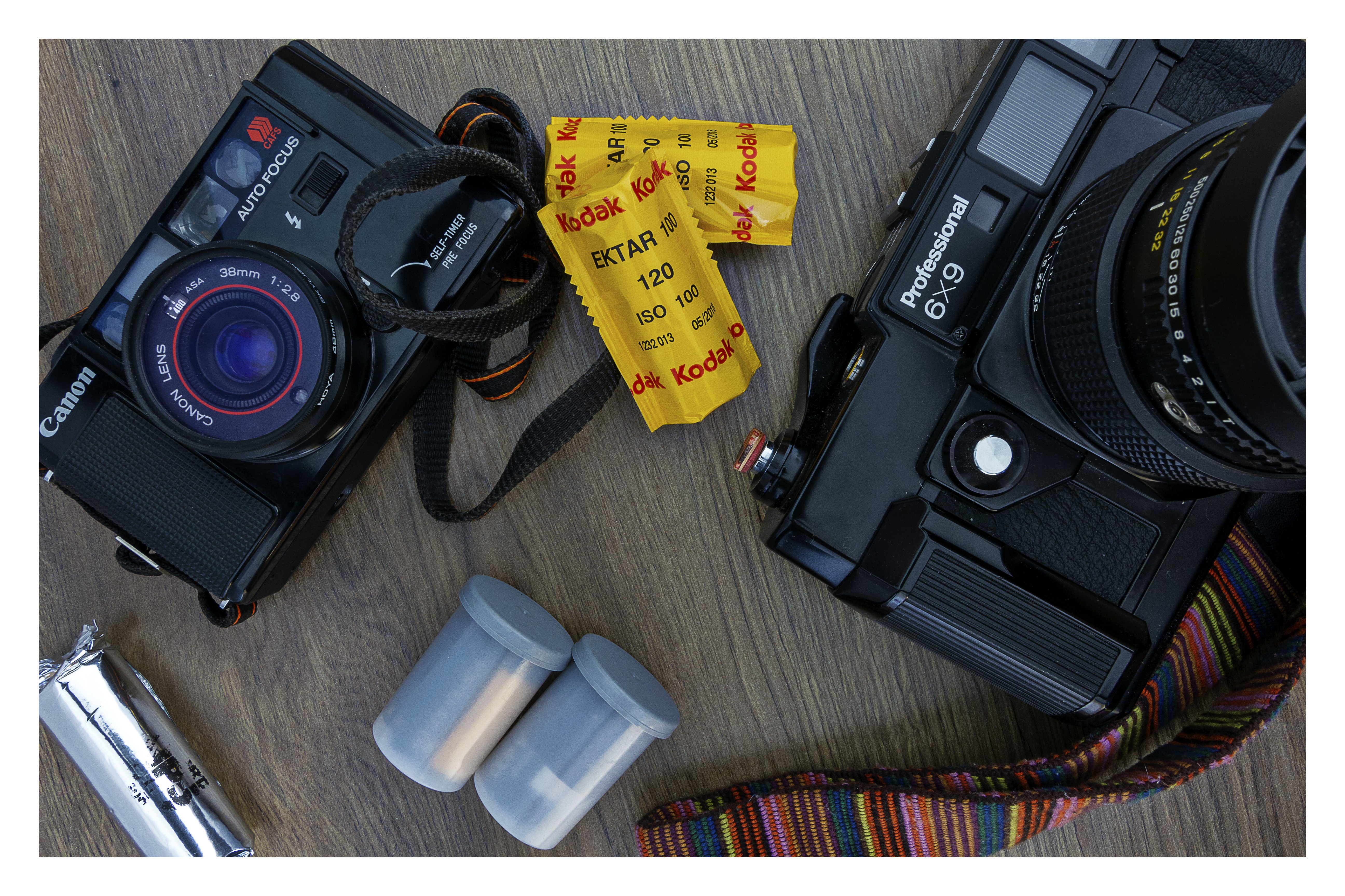 Canon and Kodak cameras with film HD Wallpaper