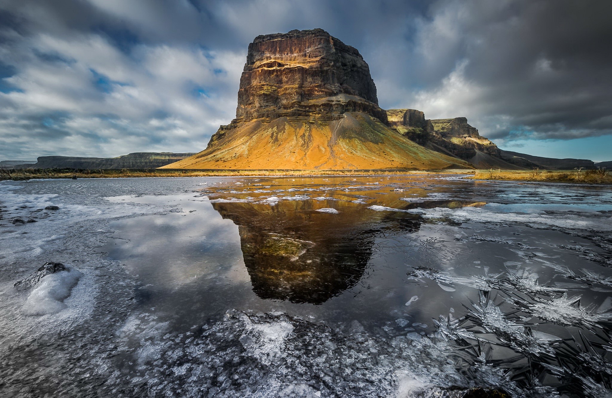 Lómagnúpur rock formation reflection in icy water HD Wallpaper