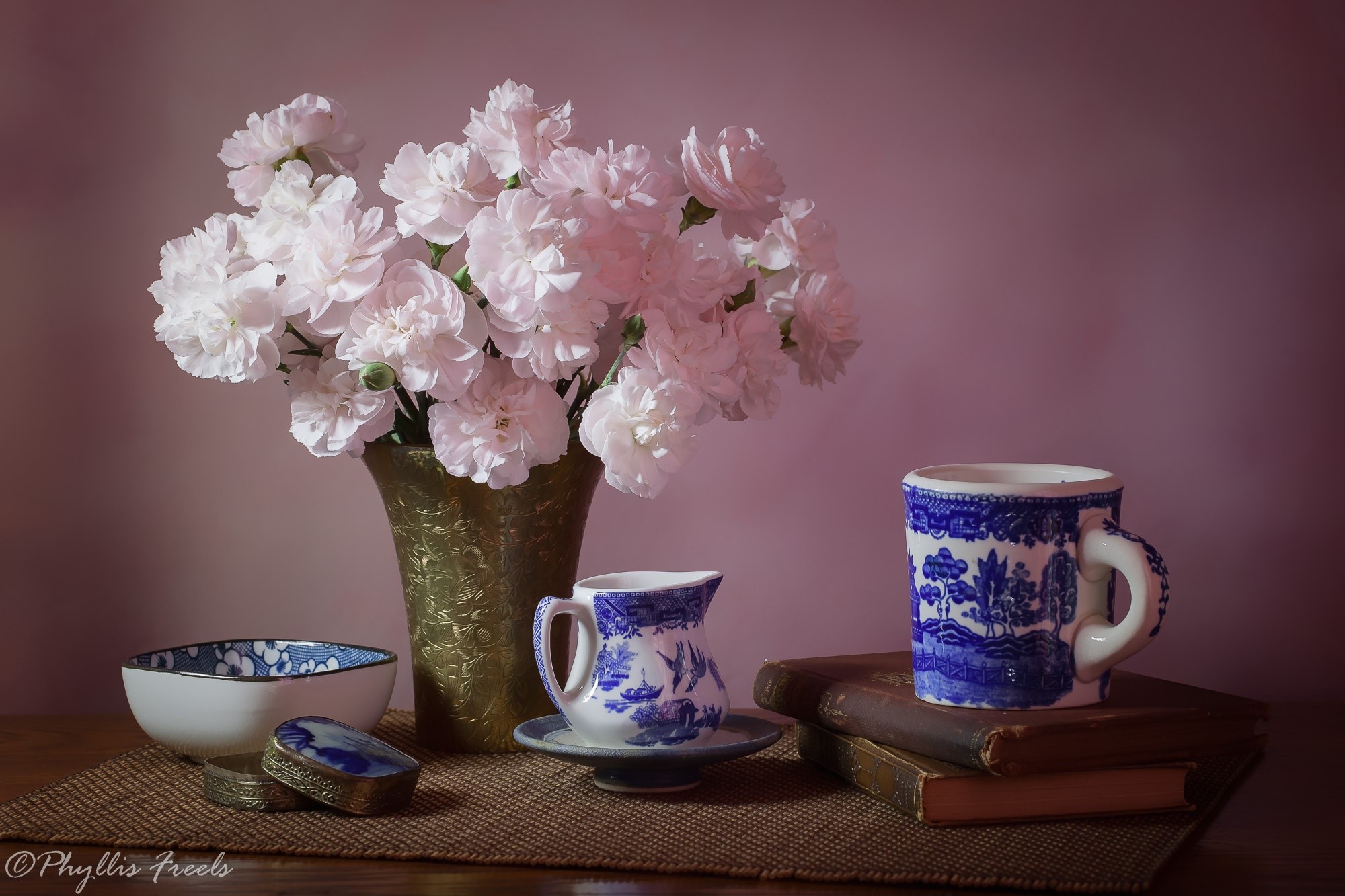 Still life with flowers, cup, and books HD Wallpaper