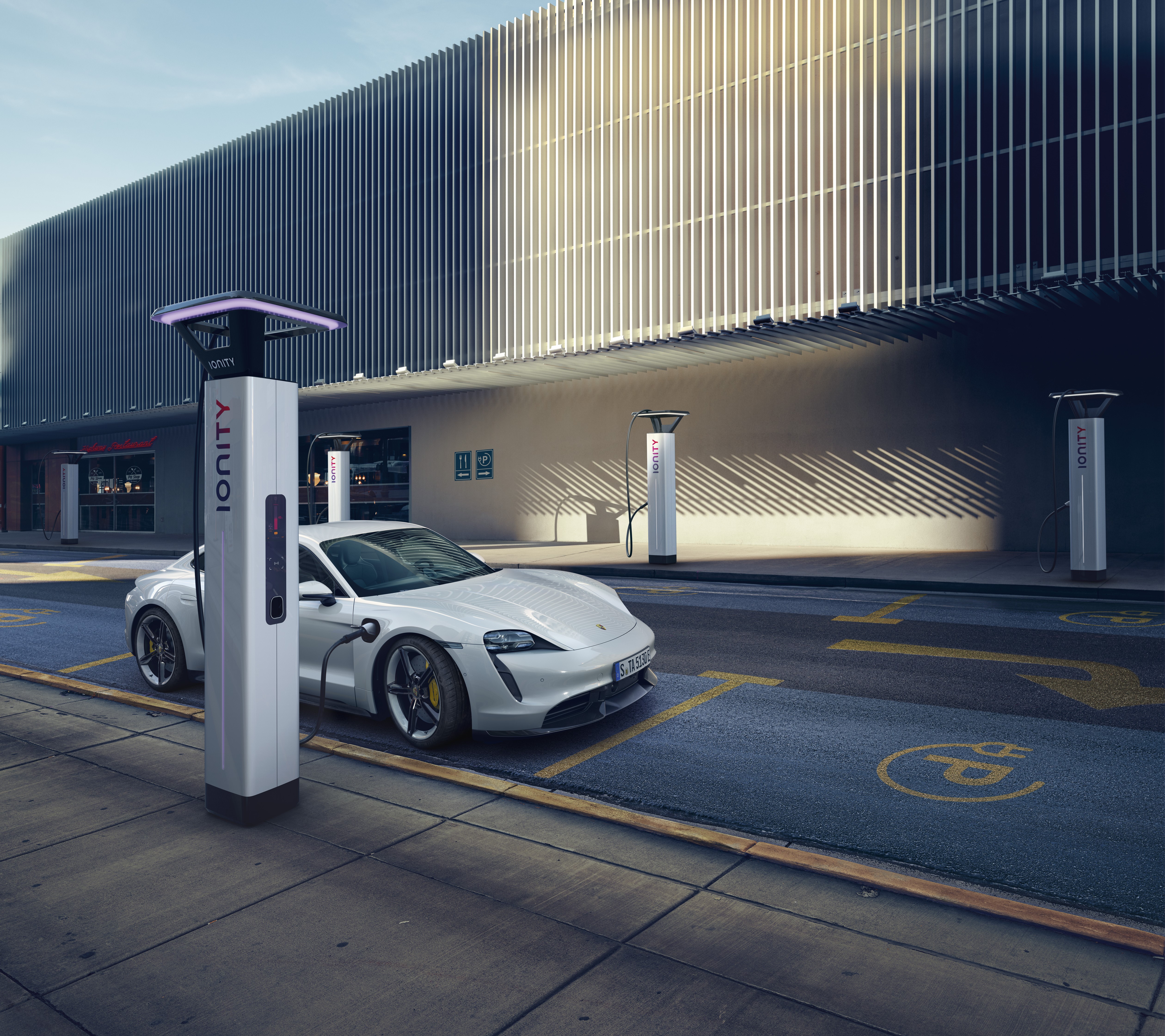 Porsche Taycan charging at Ionity station HD Wallpaper