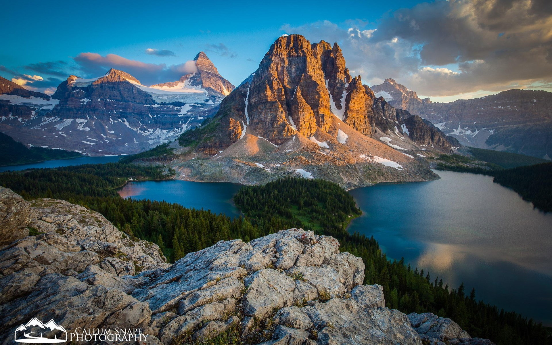 Mountain peaks and lakes at sunset HD Wallpaper