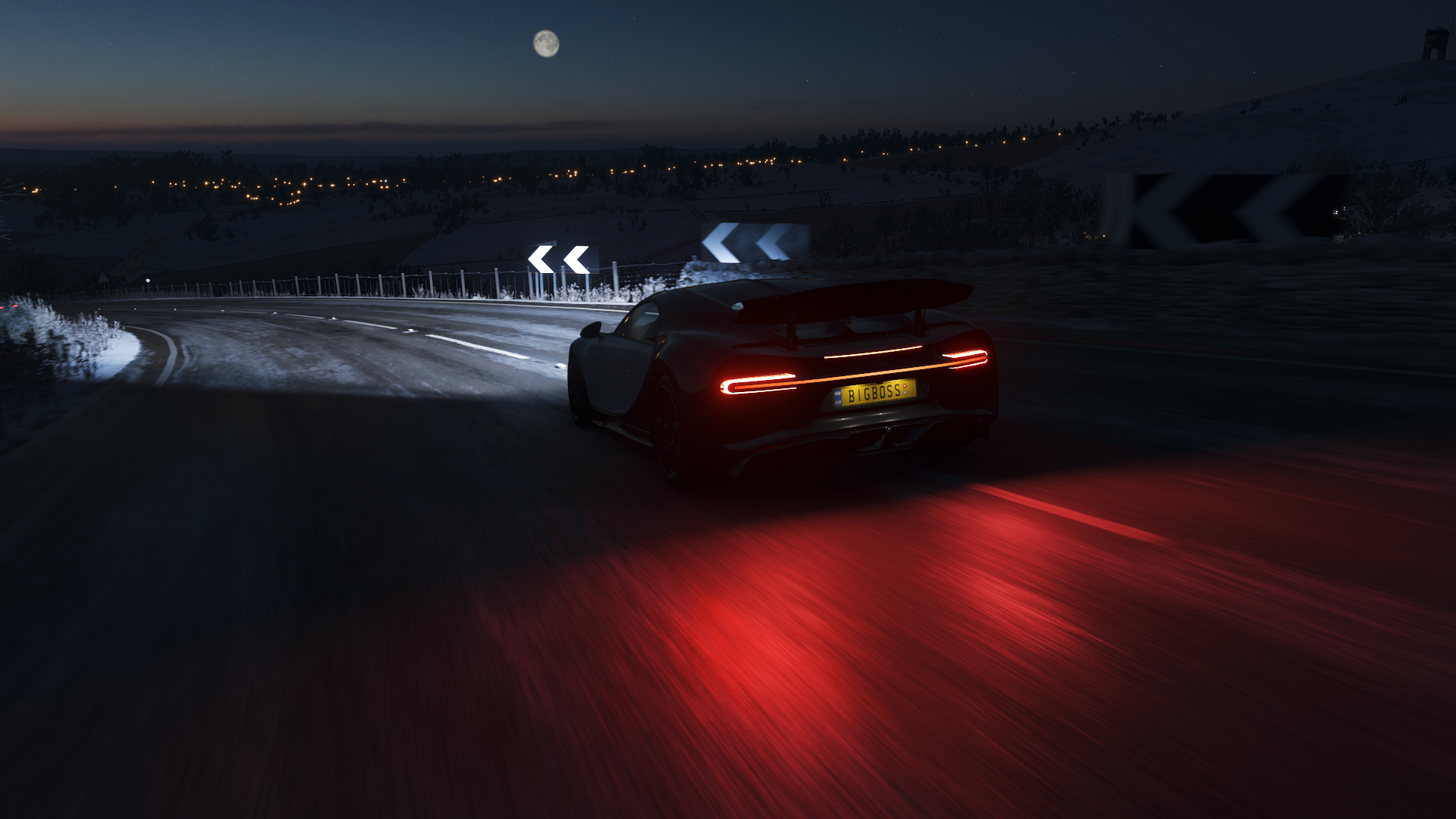 Bugatti Chiron driving on a snowy road at night in Forza Horizon 4 HD Wallpaper