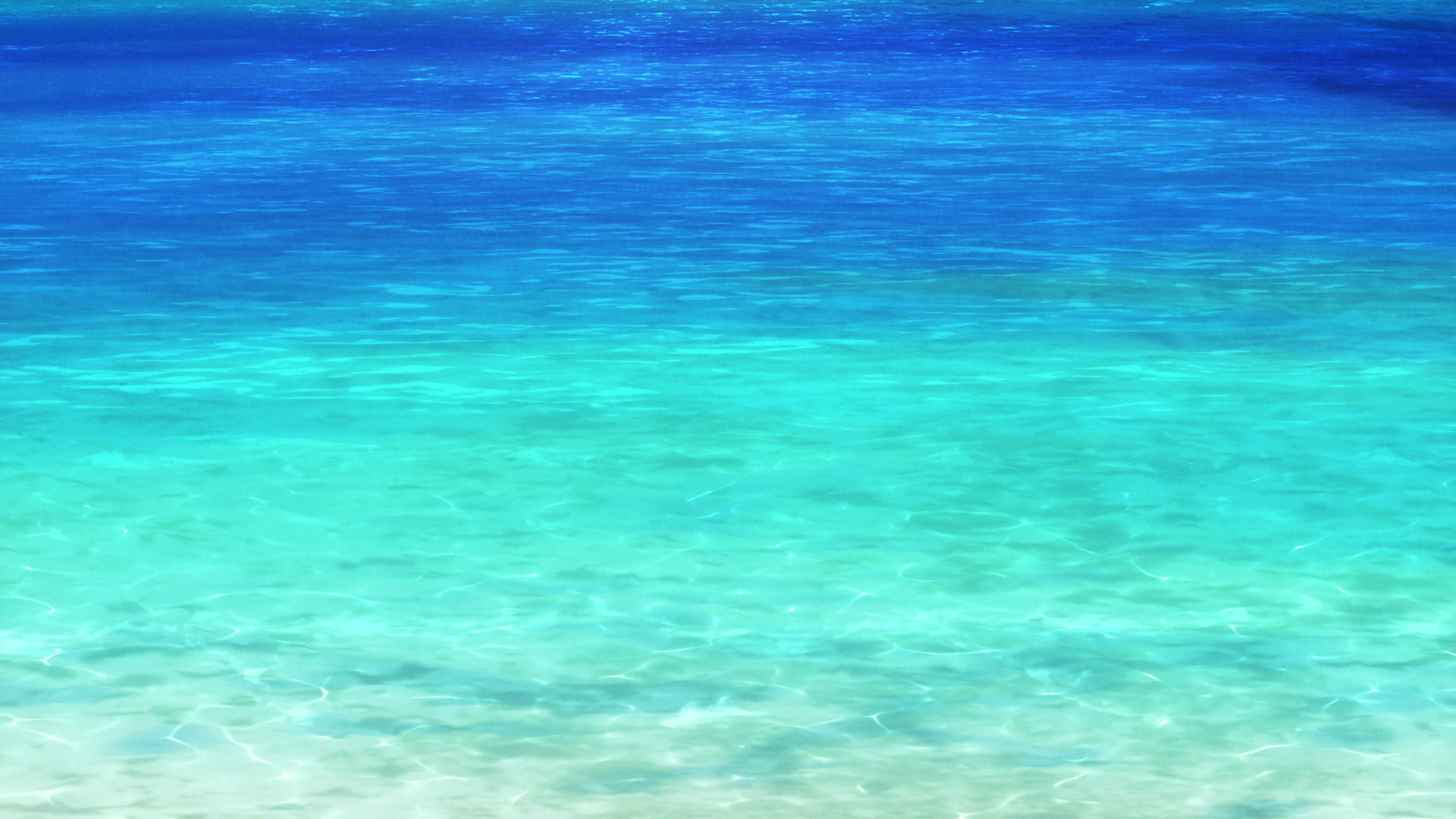Turquoise sea water with sunlight reflections HD Wallpaper