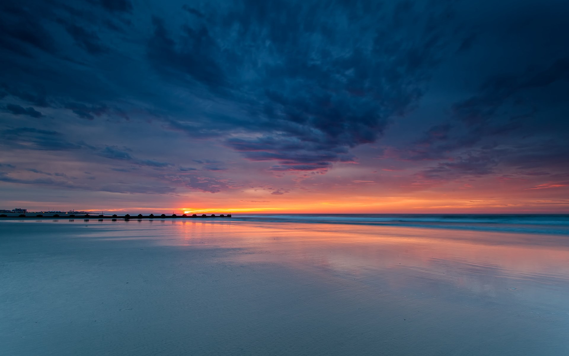 Sunset over the ocean with a pier HD Wallpaper