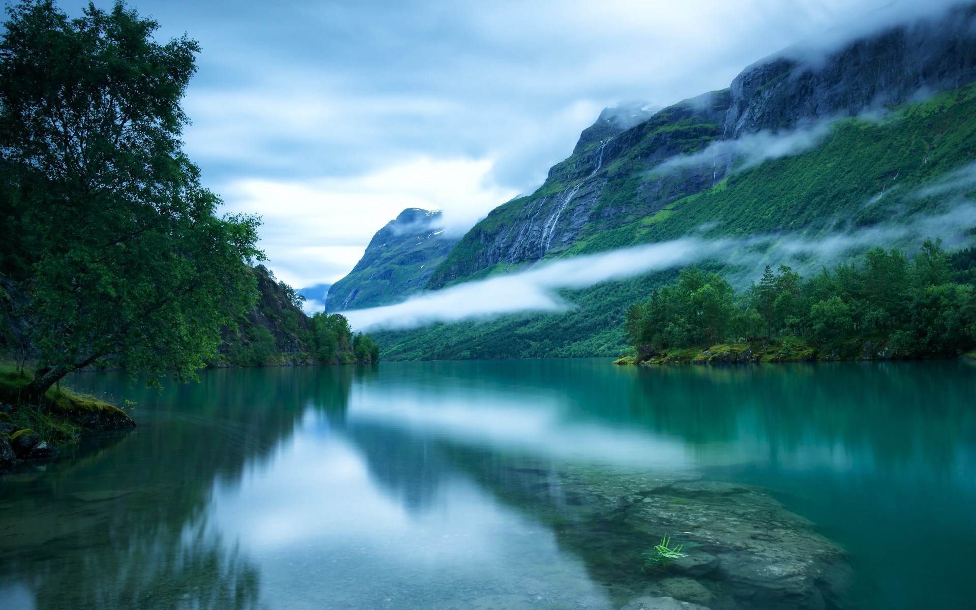 Misty mountains and a tranquil lake in Norway HD Wallpaper