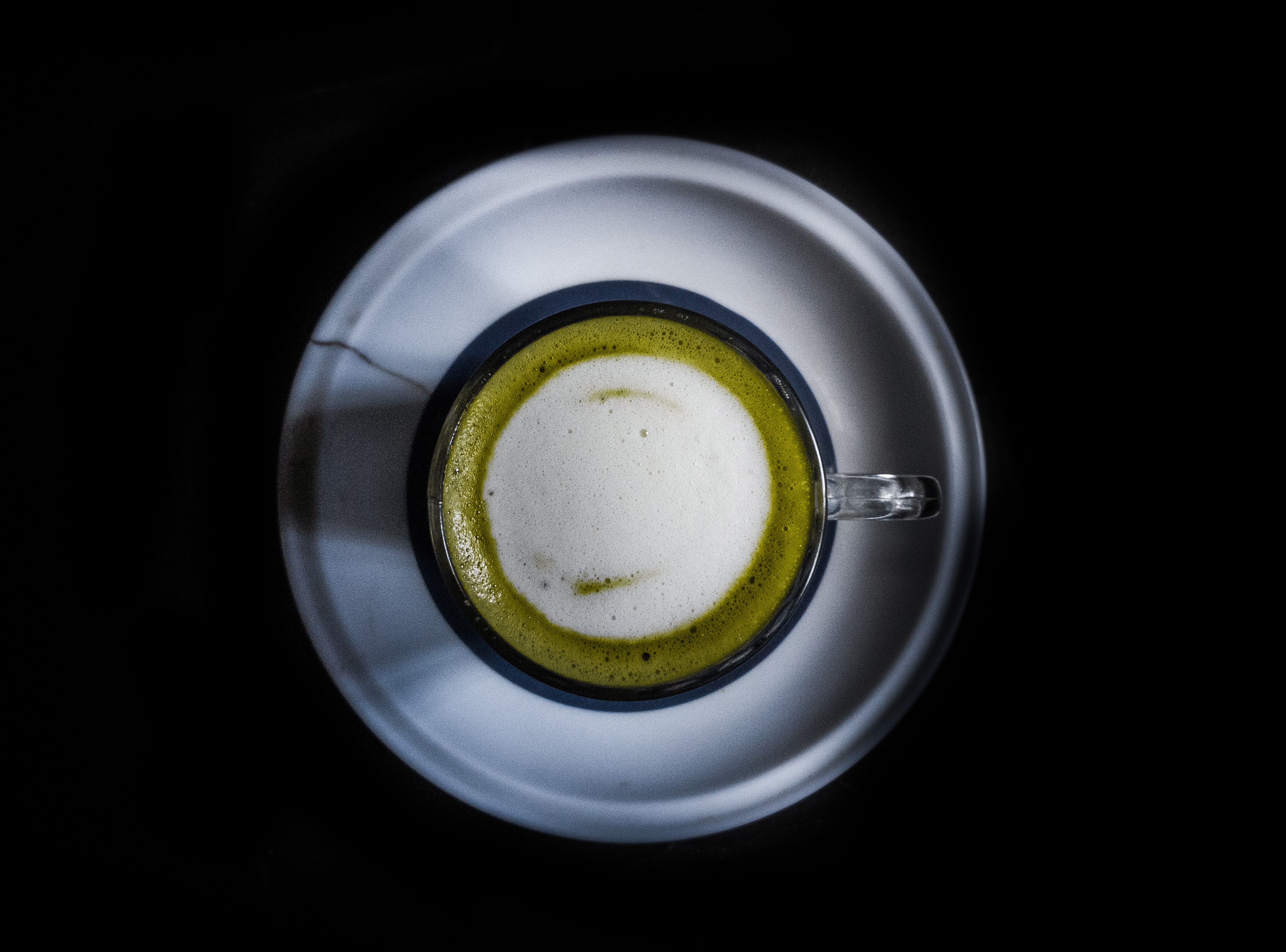 Matcha tea in a cup on a saucer HD Wallpaper