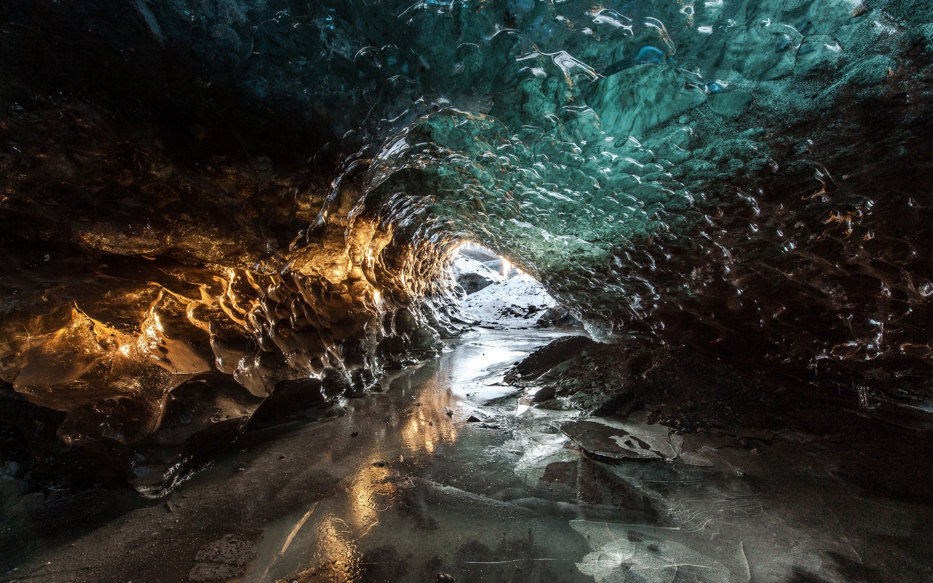 Ice cave with water and light HD Wallpaper