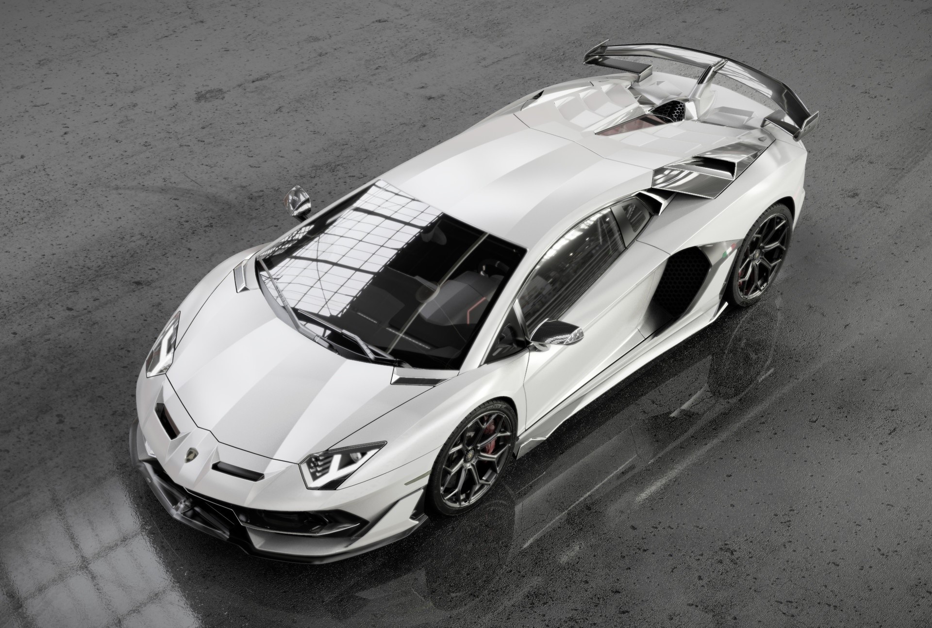 White Lamborghini Aventador SVJ parked on a wet surface HD Wallpaper