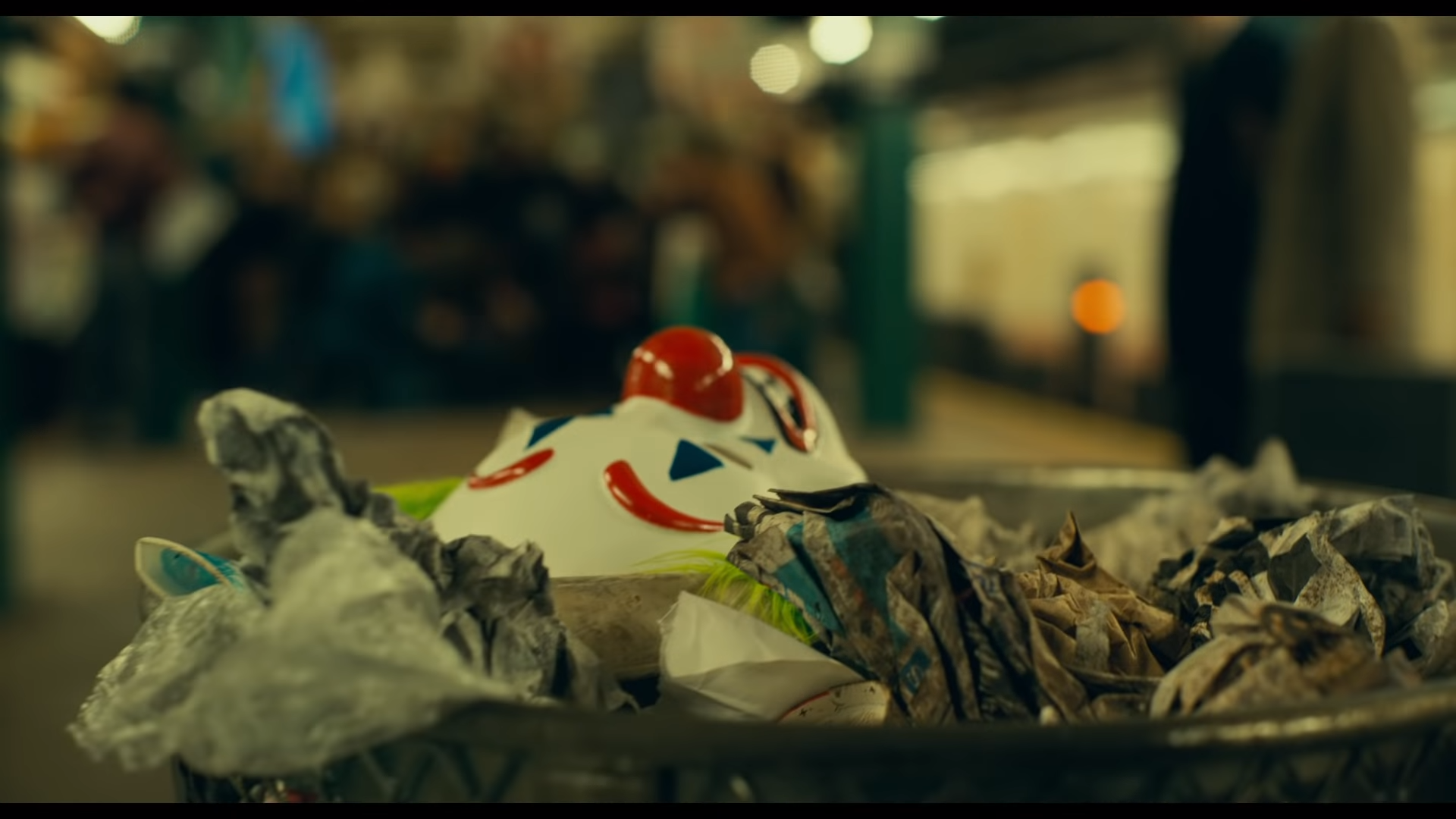 Joker mask in trash can HD Wallpaper
