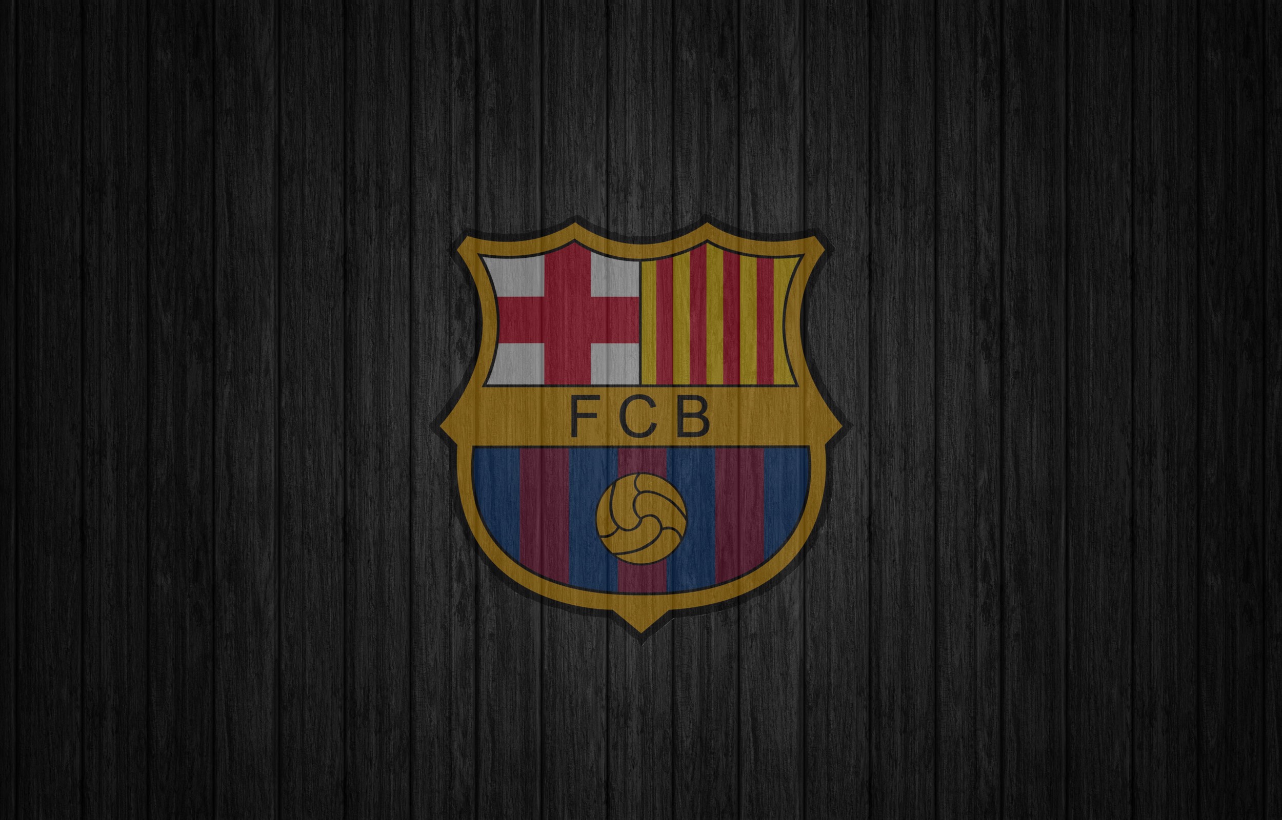 FC Barcelona logo on a dark wooden background HD Wallpaper
