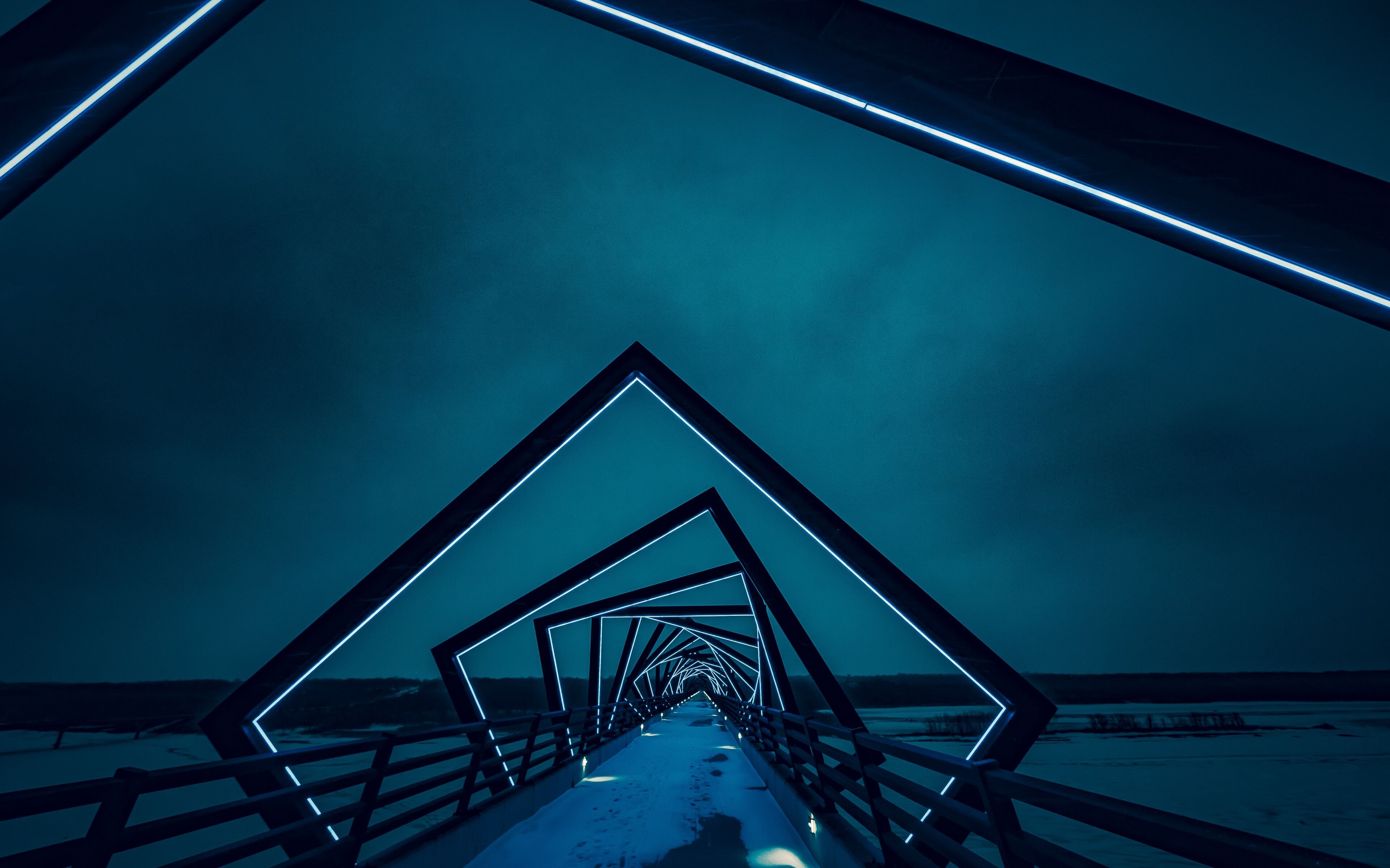Geometric bridge with blue lights at night HD Wallpaper