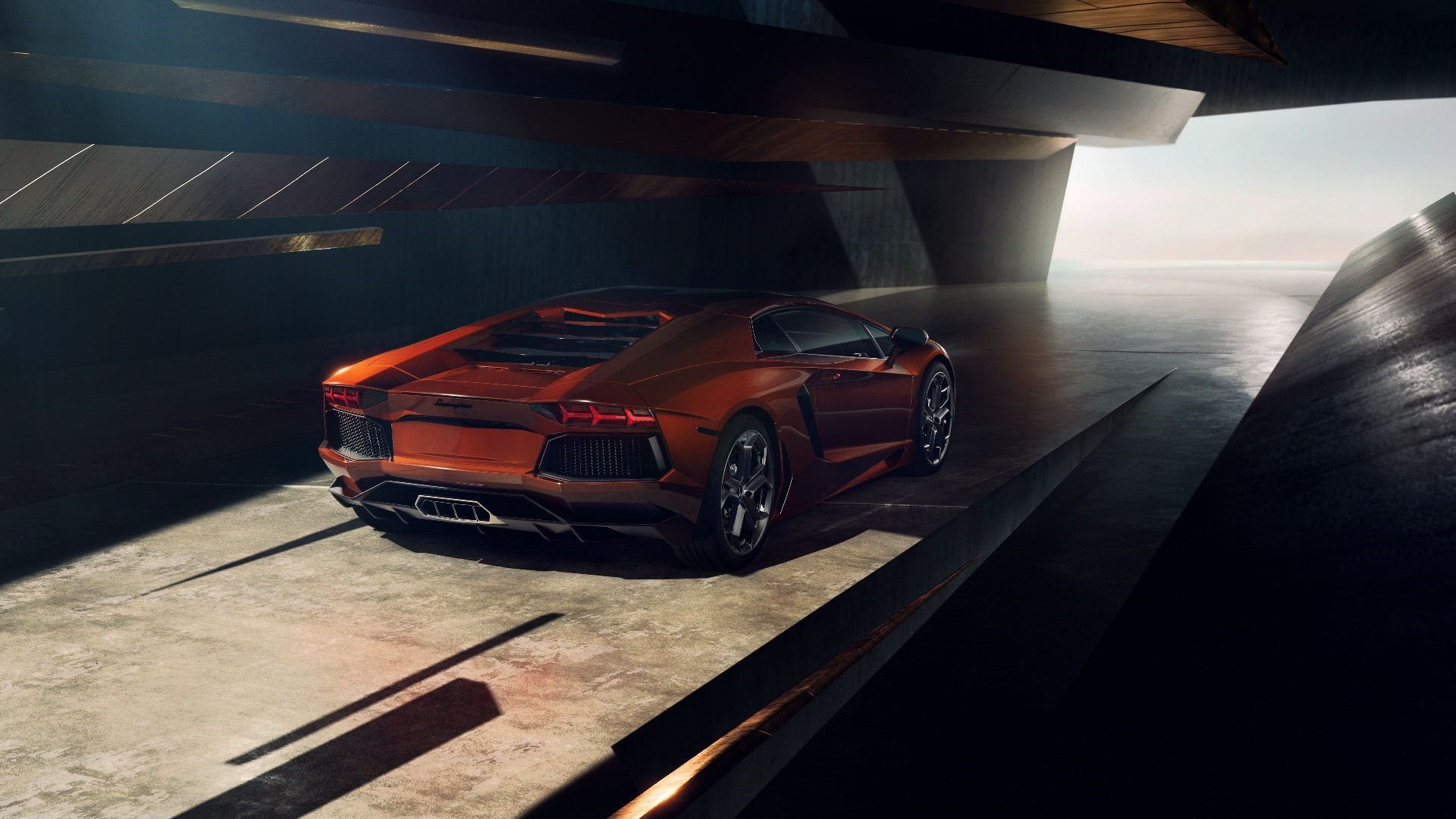 Orange Lamborghini Aventador in a Modern Structure HD Wallpaper