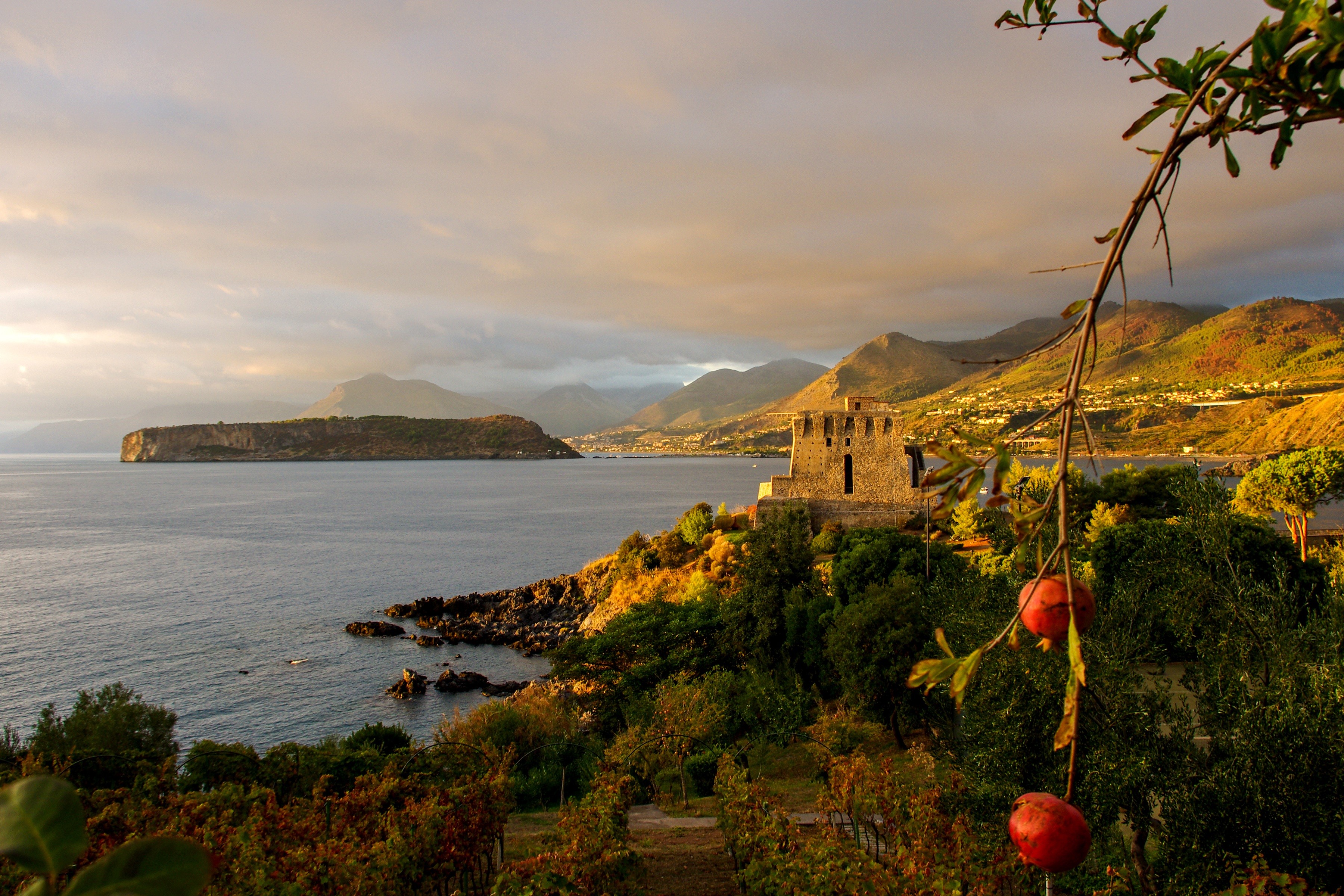 Castle on a cliff overlooking the sea in Calabria, Italy HD Wallpaper