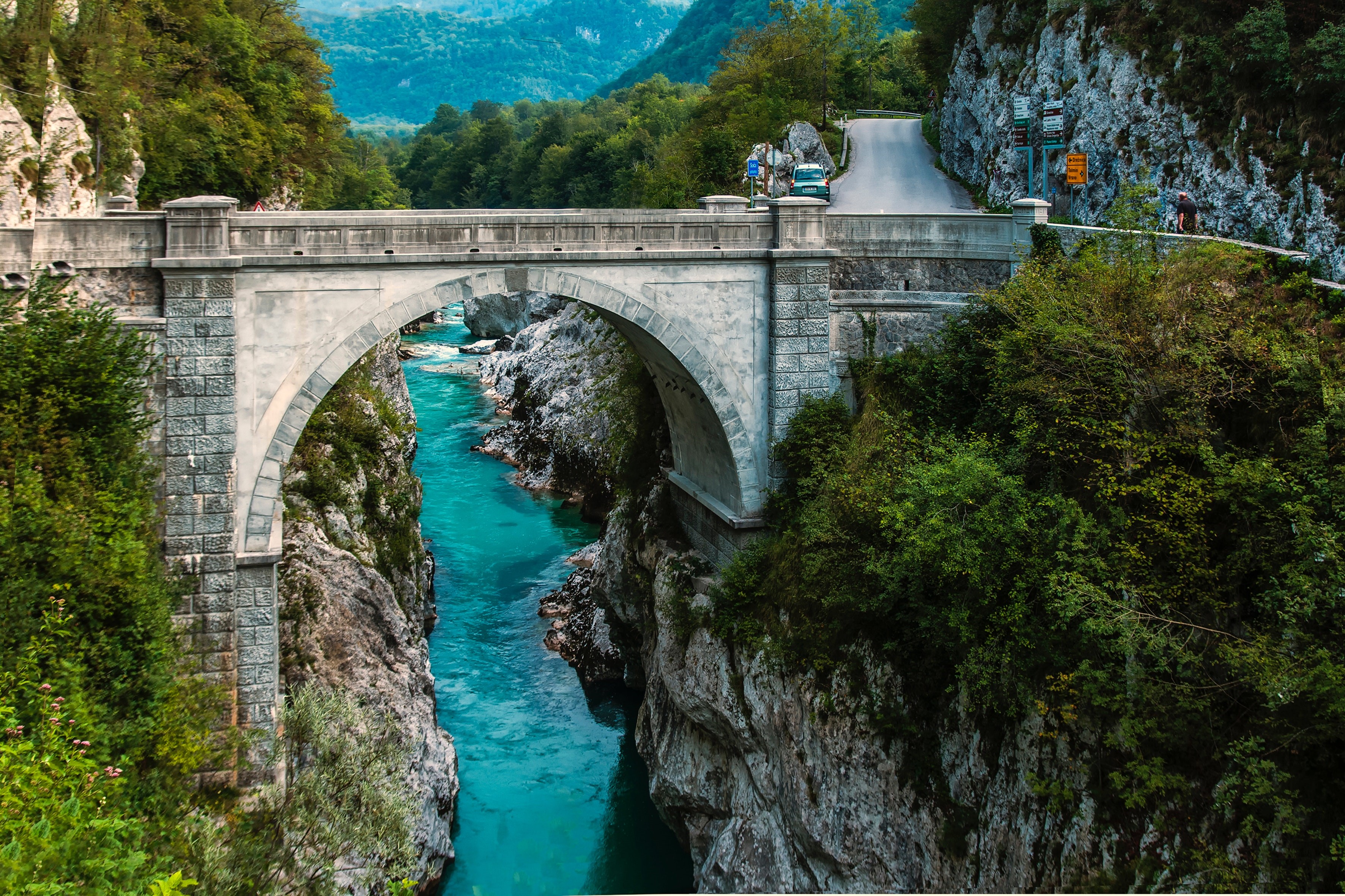 Bridge over a turquoise river in a gorge in Slovenia HD Wallpaper