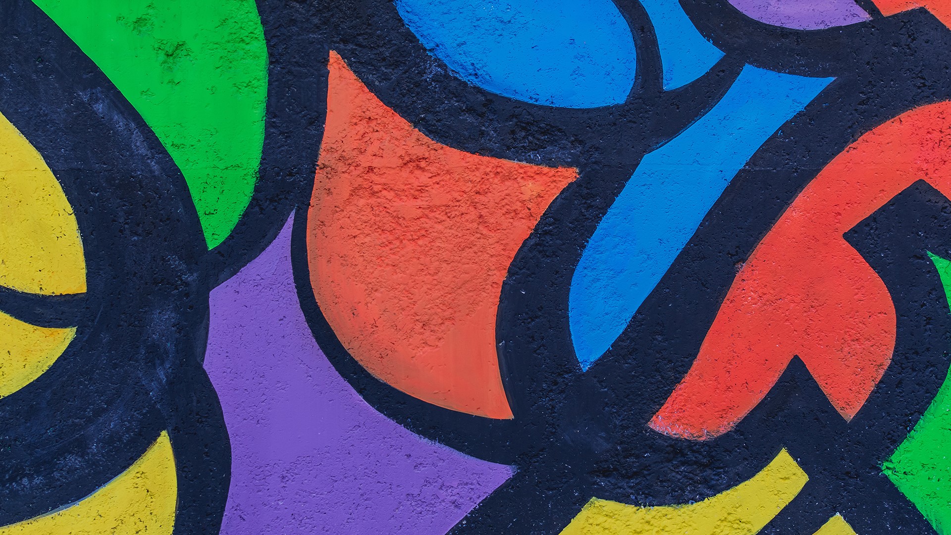 Colorful graffiti art on a textured wall HD Wallpaper