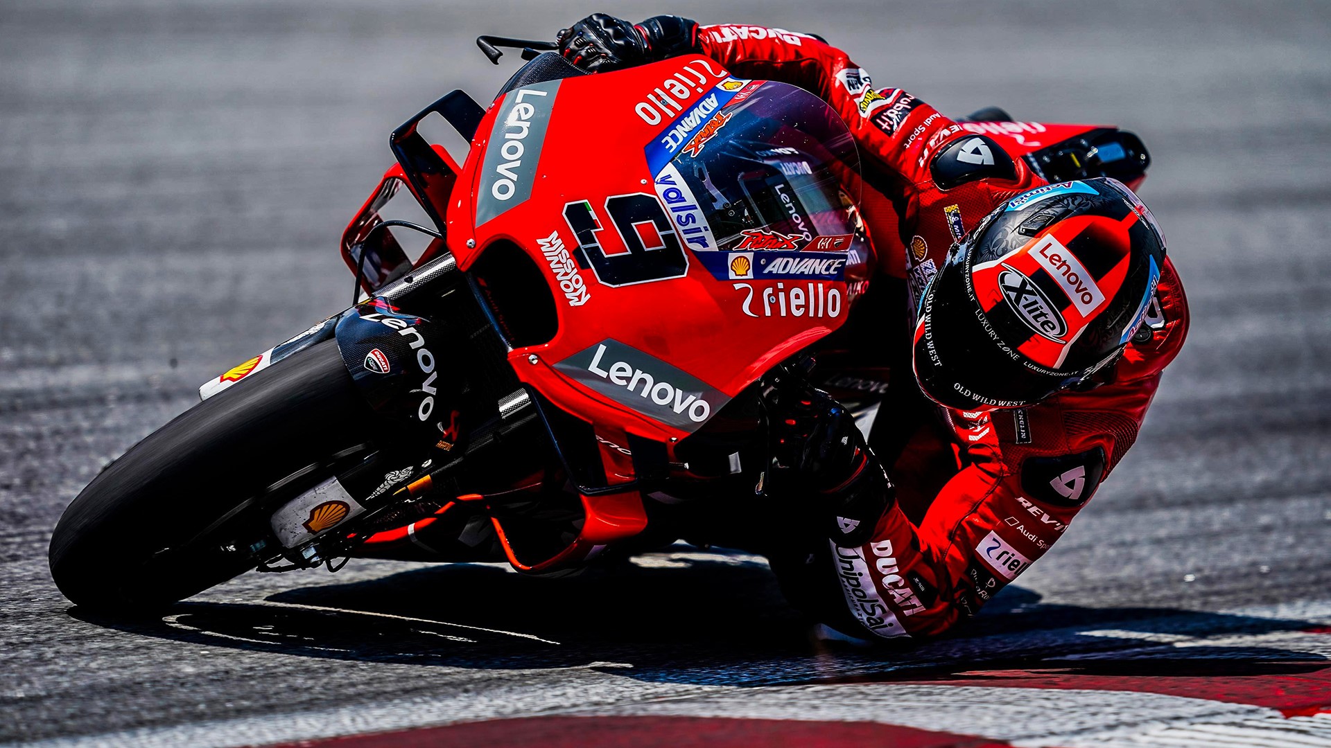 Francesco Bagnaia on a Ducati motorcycle HD Wallpaper