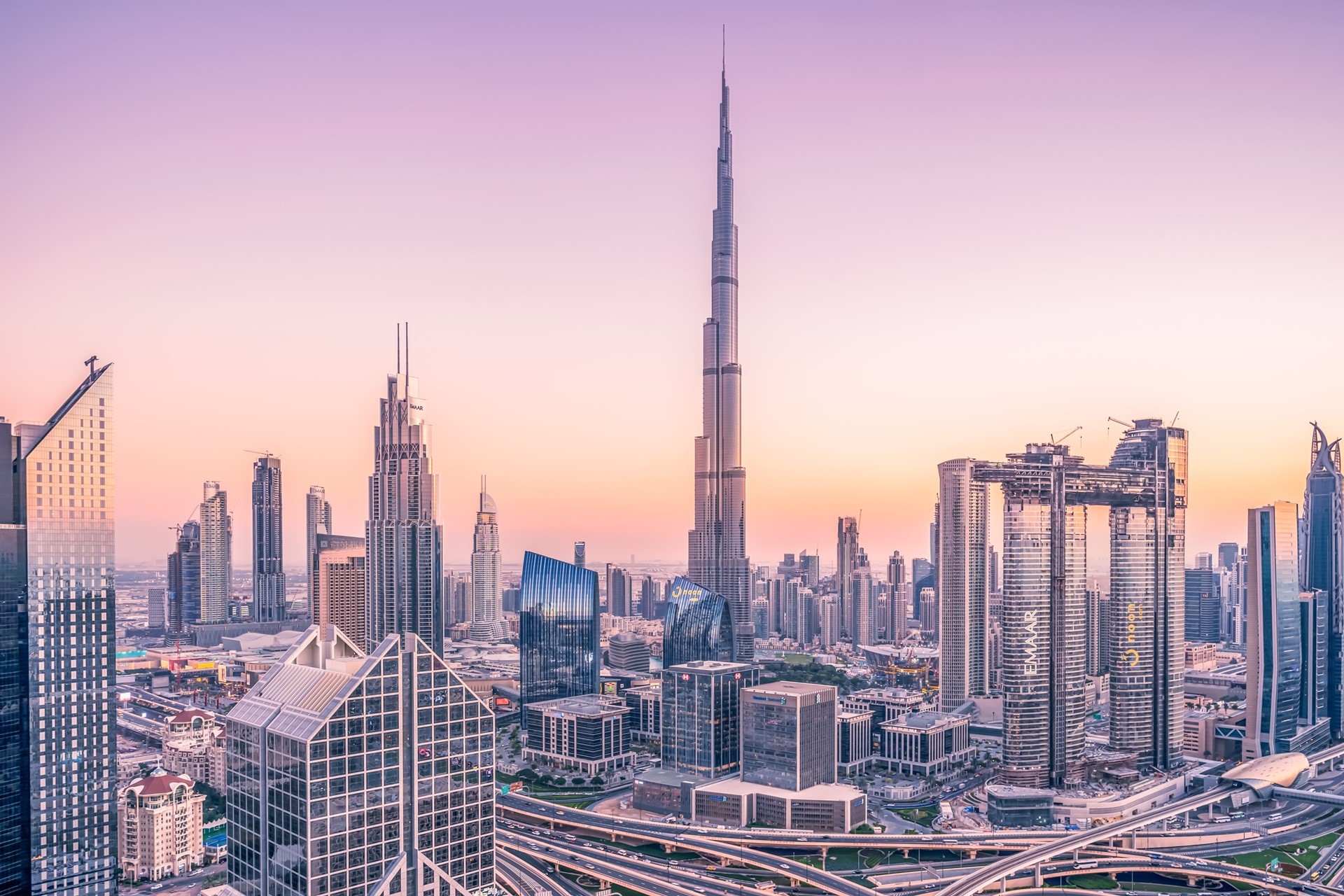 Dubai cityscape with Burj Khalifa at sunset HD Wallpaper