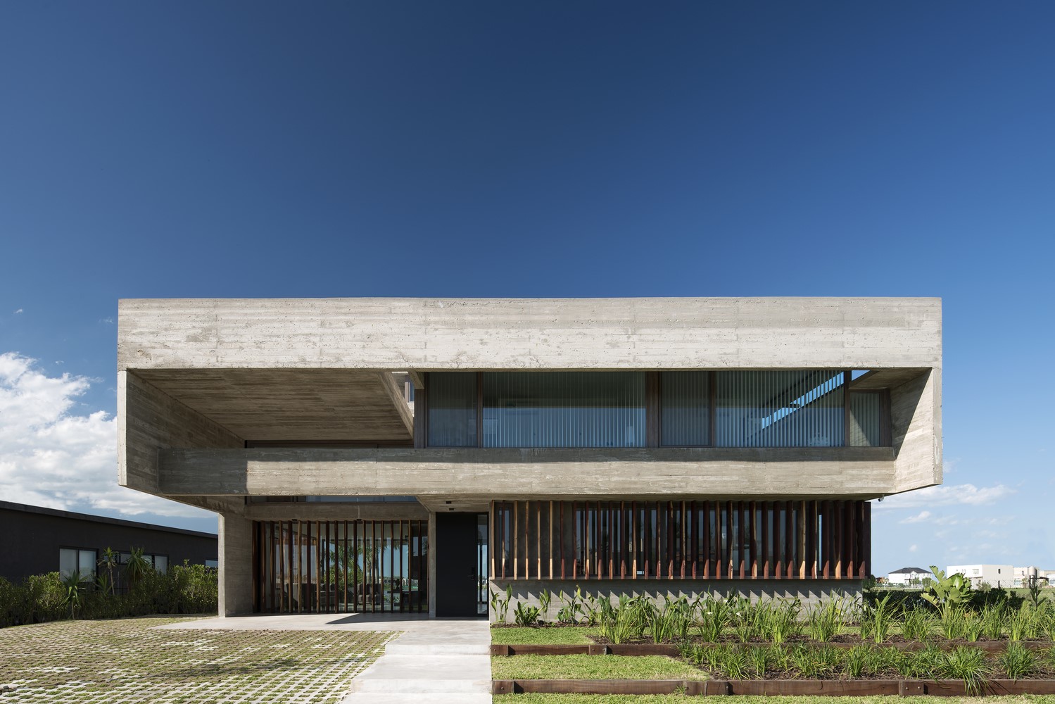 Modern concrete house with wooden louvers HD Wallpaper