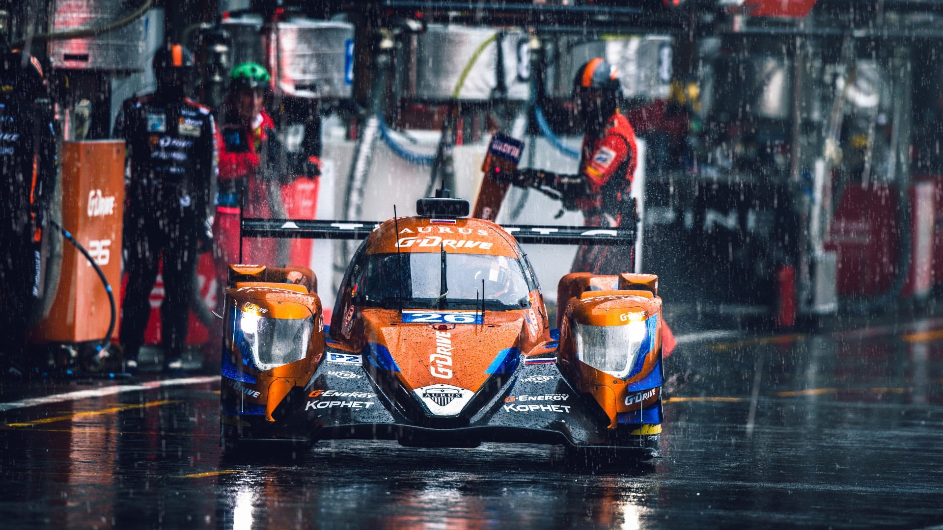 Aurus G-Drive race car in the rain HD Wallpaper