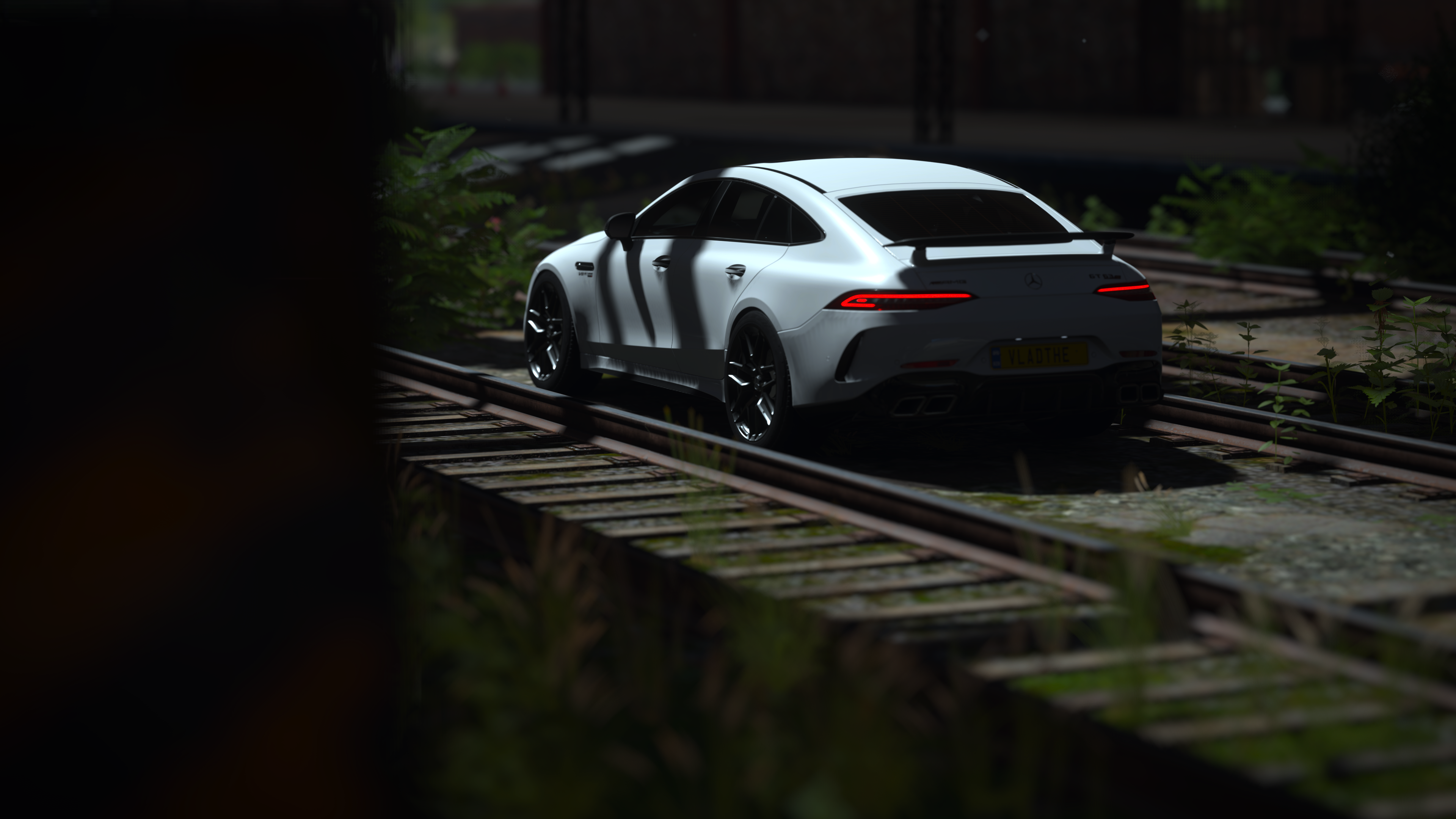 White Mercedes-AMG GT 4-Door Coupe on train tracks HD Wallpaper