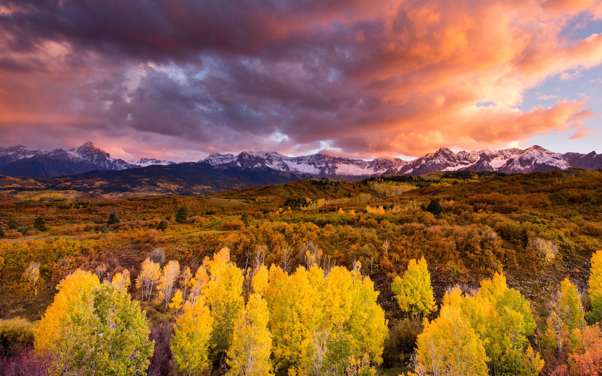 Autumn Mountain Landscape with Colorful Trees and Dramatic Sky HD Wallpaper