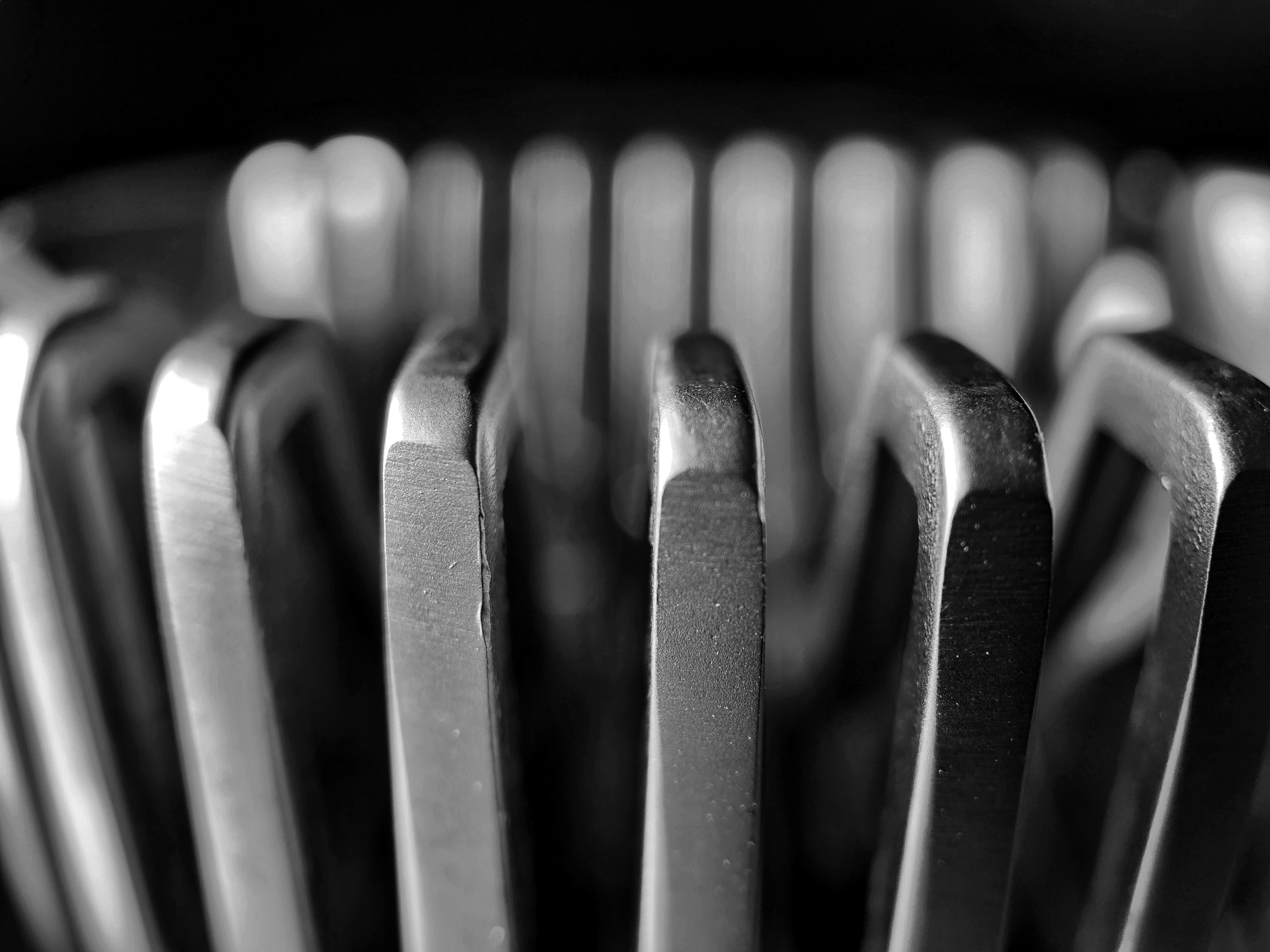 Monochrome close-up of metal hex keys HD Wallpaper