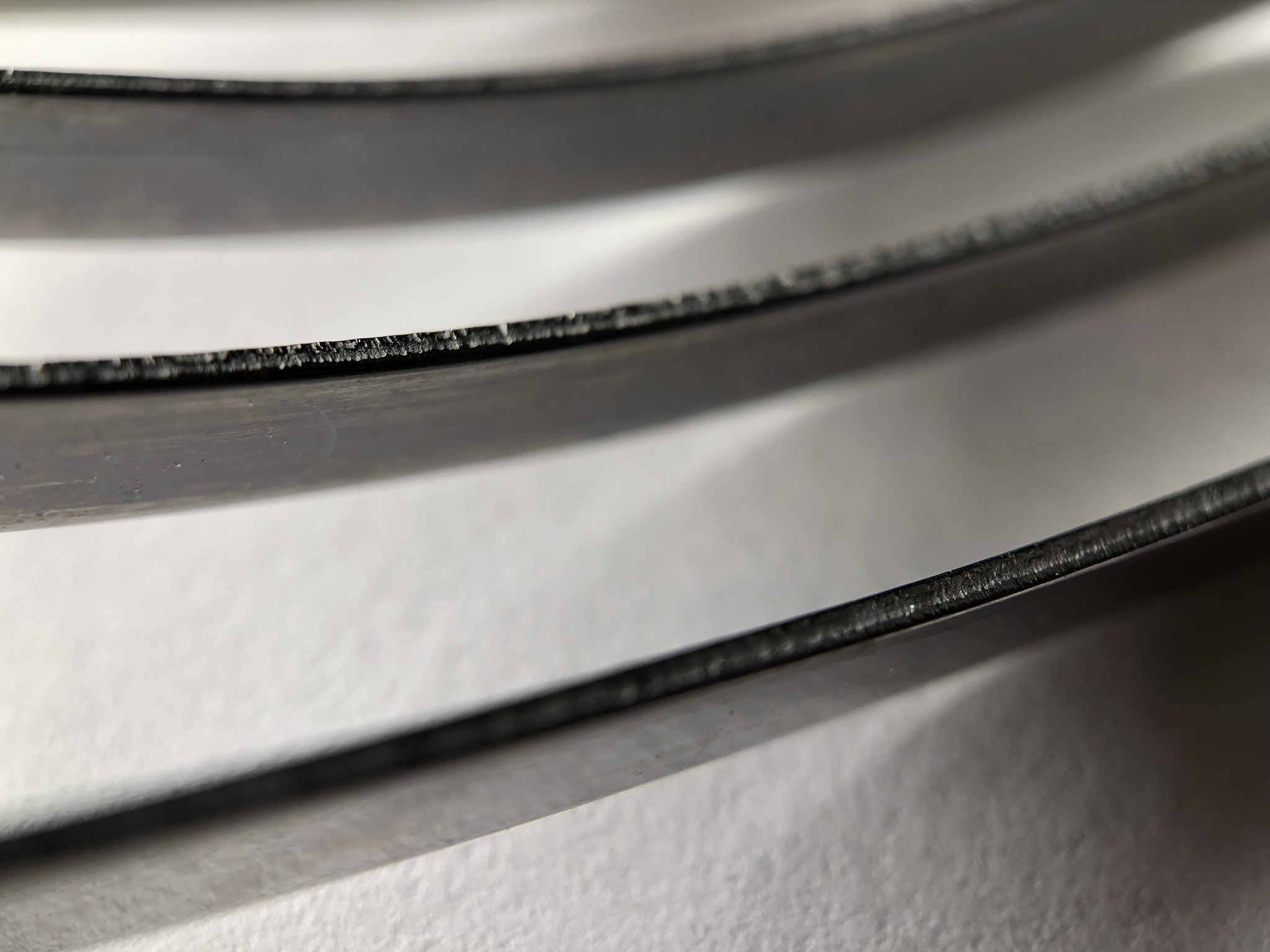 Close-up of metal edges with bokeh HD Wallpaper