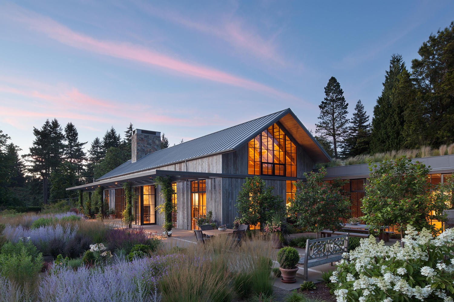 Modern wooden house with large windows and garden HD Wallpaper