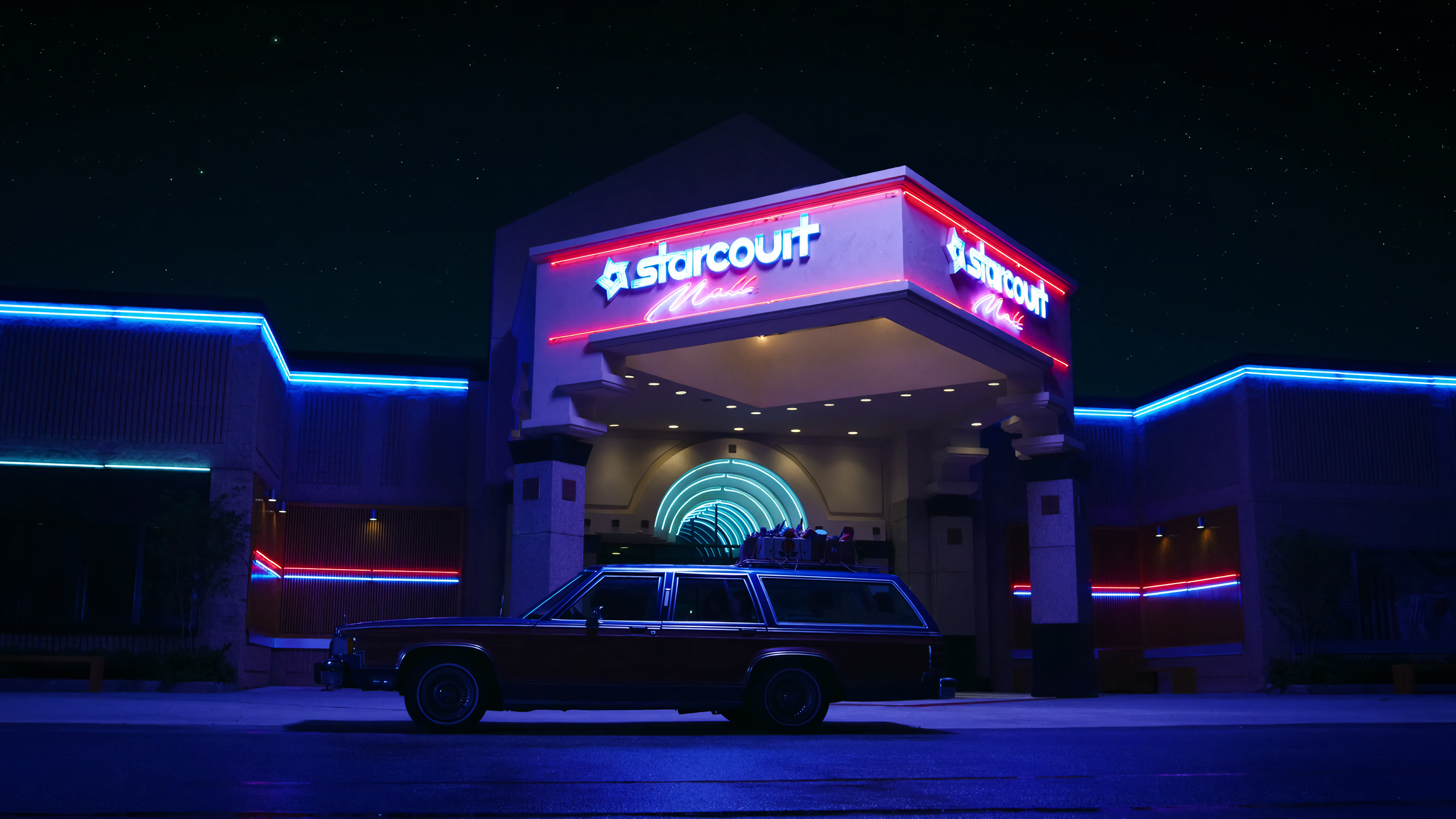 Stranger Things Starcourt Mall at Night with Car HD Wallpaper