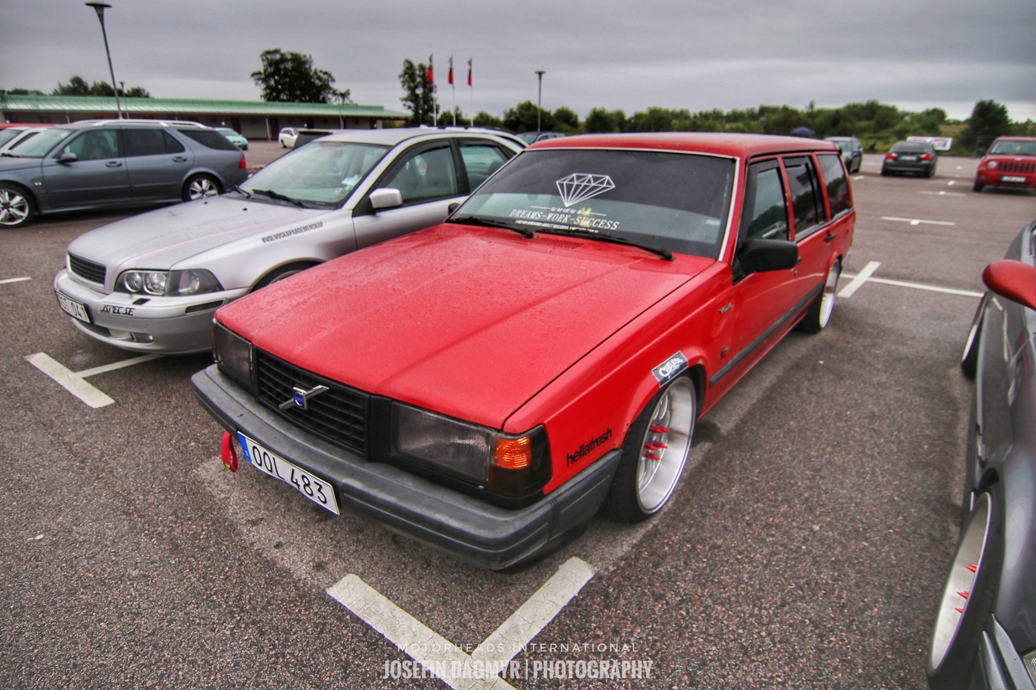 Red Volvo station wagon with custom wheels HD Wallpaper