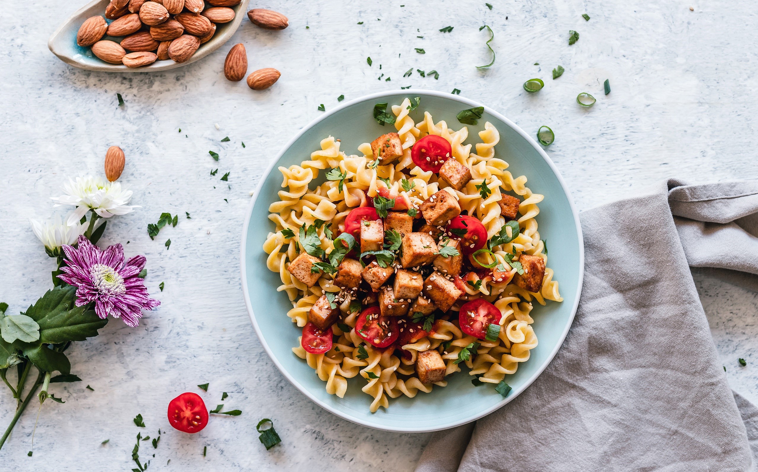 Pasta with Tofu and Tomatoes, Almonds, and Flowers HD Wallpaper