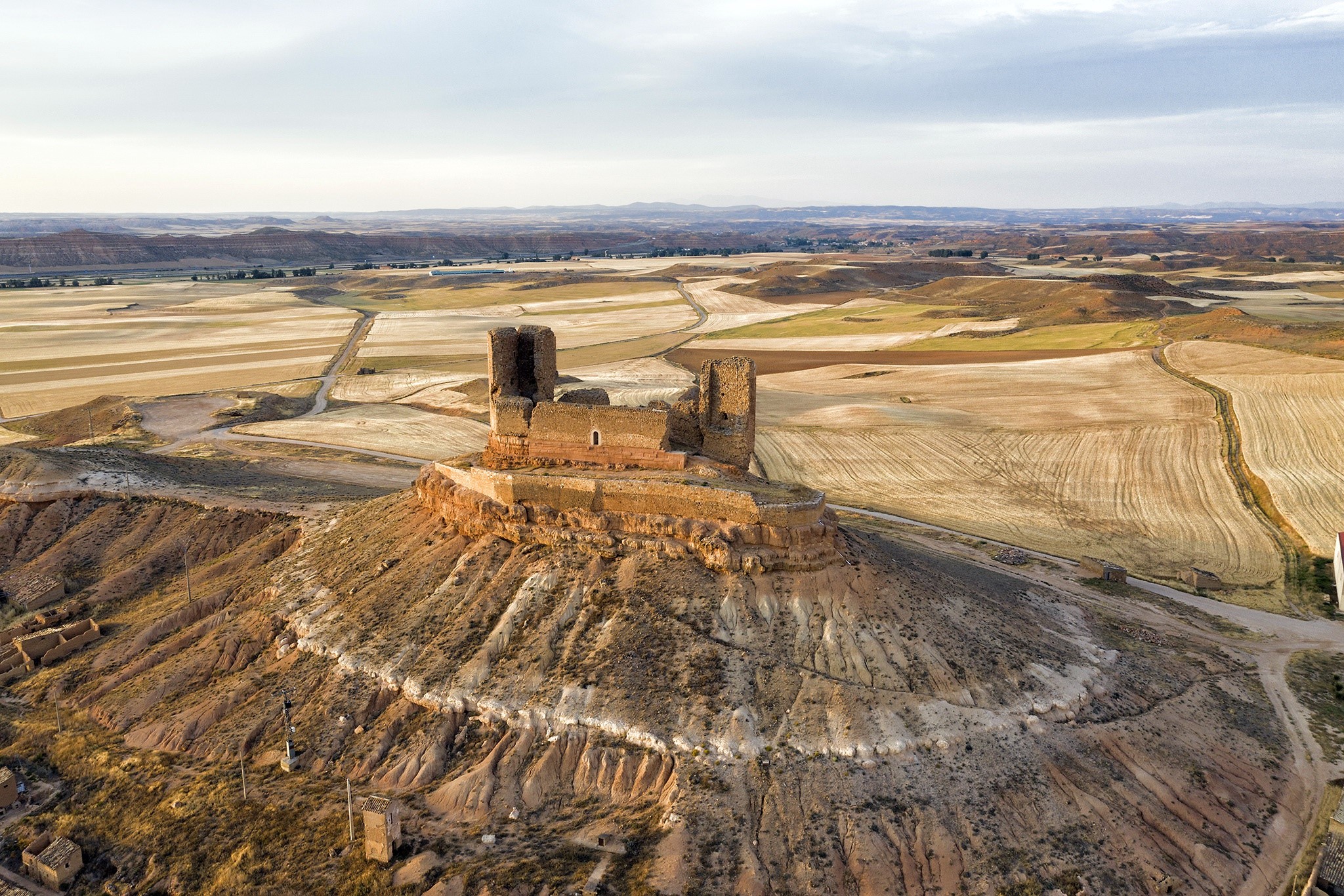 Ruined castle on a hill in Spain, aerial view HD Wallpaper
