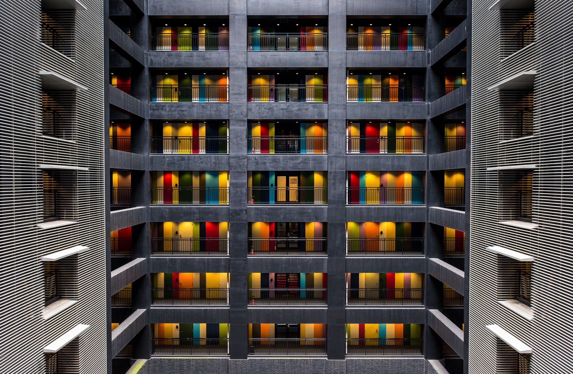 Colorful doors in a modern building atrium HD Wallpaper