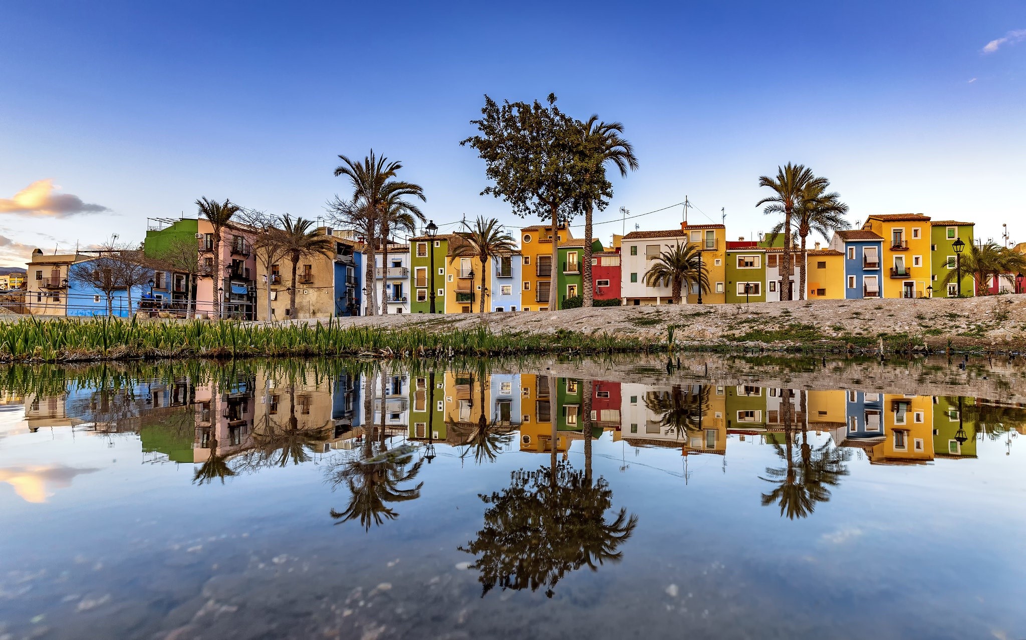 Colorful houses reflected in water HD Wallpaper
