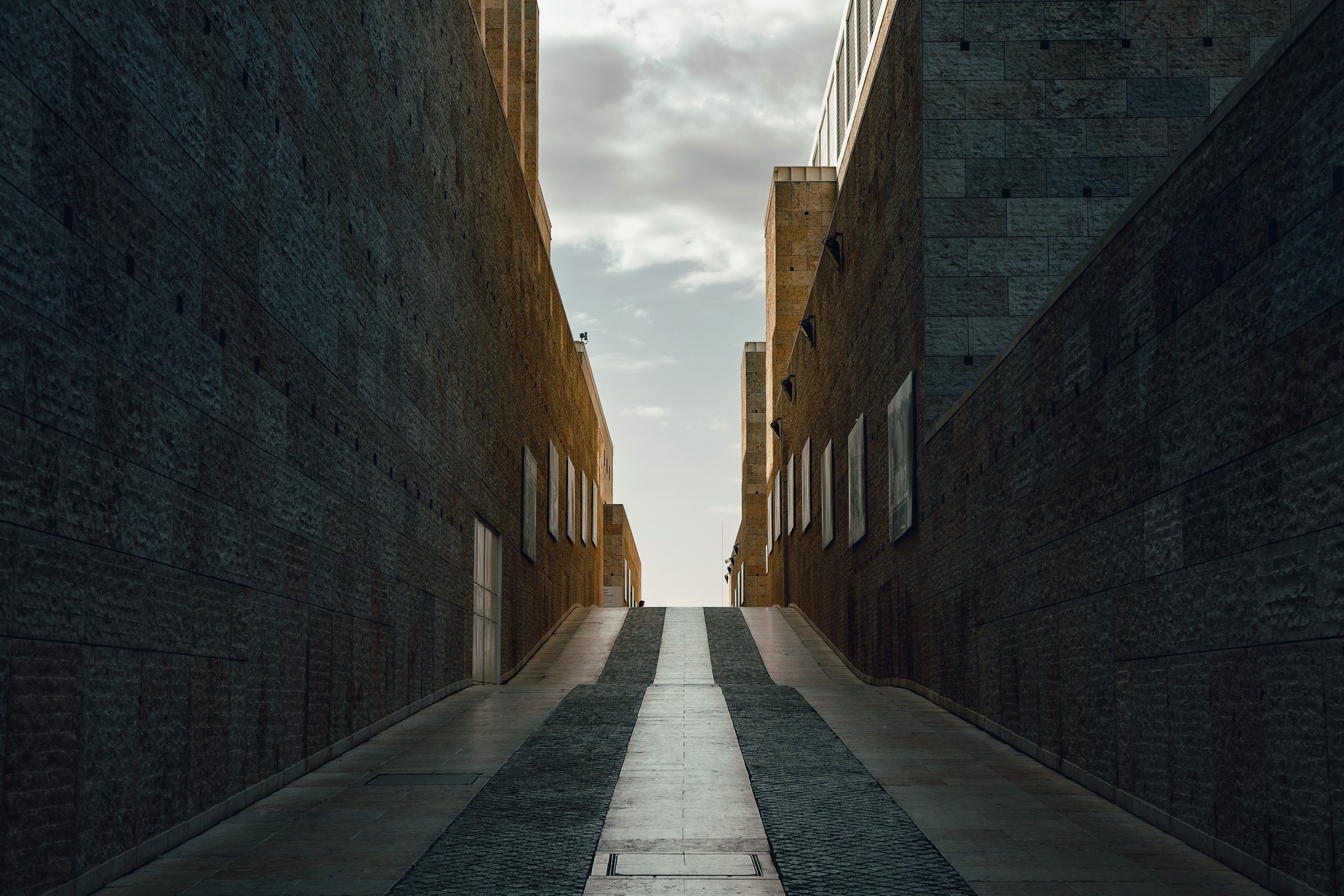 Street between modern buildings in Lisbon, Portugal HD Wallpaper
