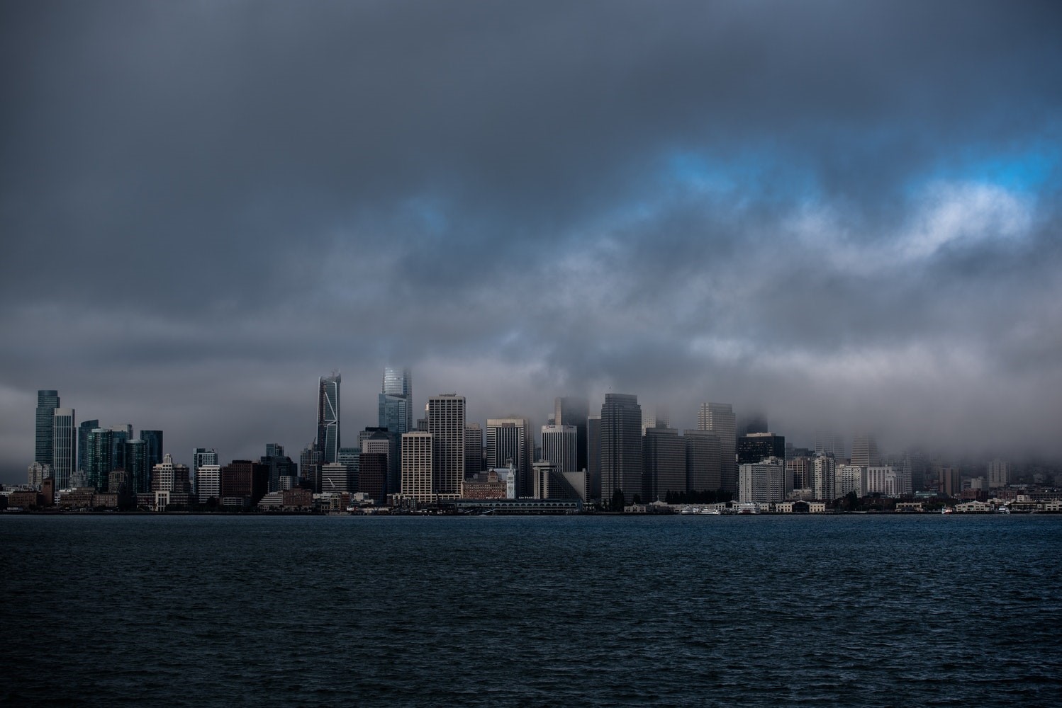 San Francisco cityscape with clouds over the water HD Wallpaper