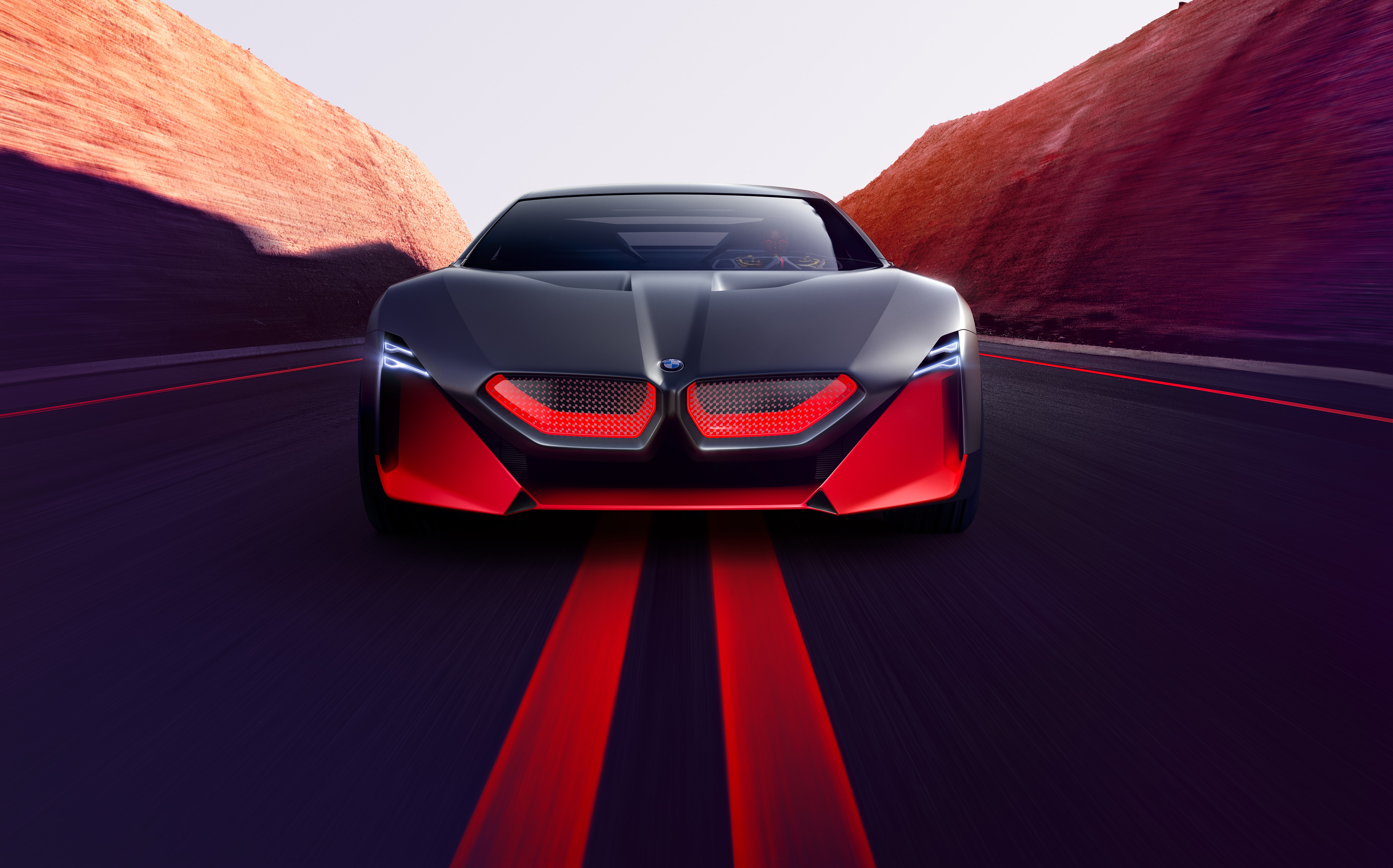 BMW Vision M NEXT concept car on a road HD Wallpaper