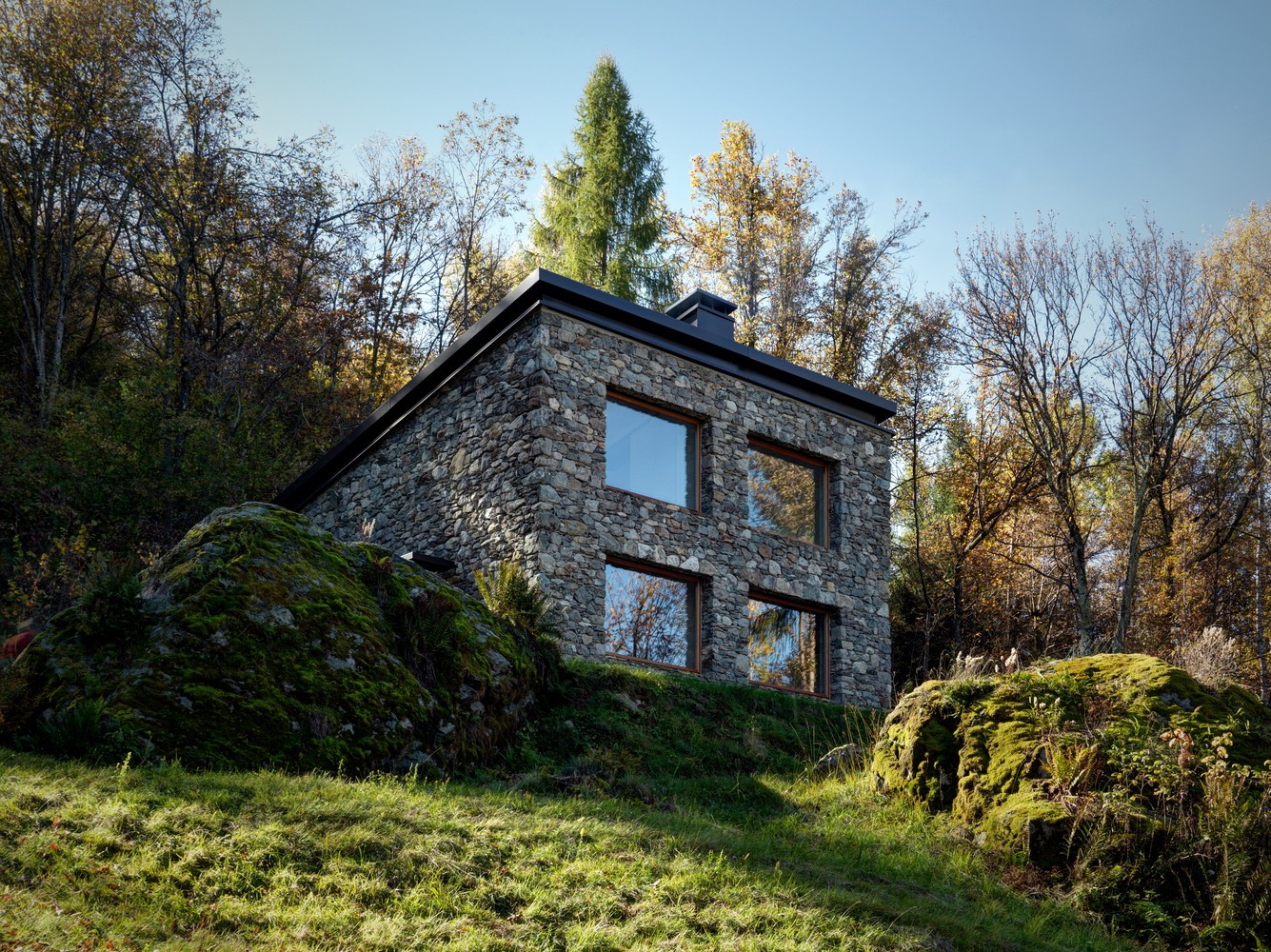 Stone house with windows in a forest HD Wallpaper