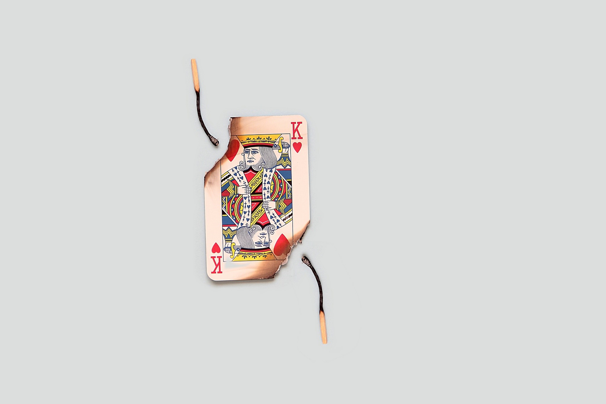 King of Hearts playing card burning with matchsticks HD Wallpaper
