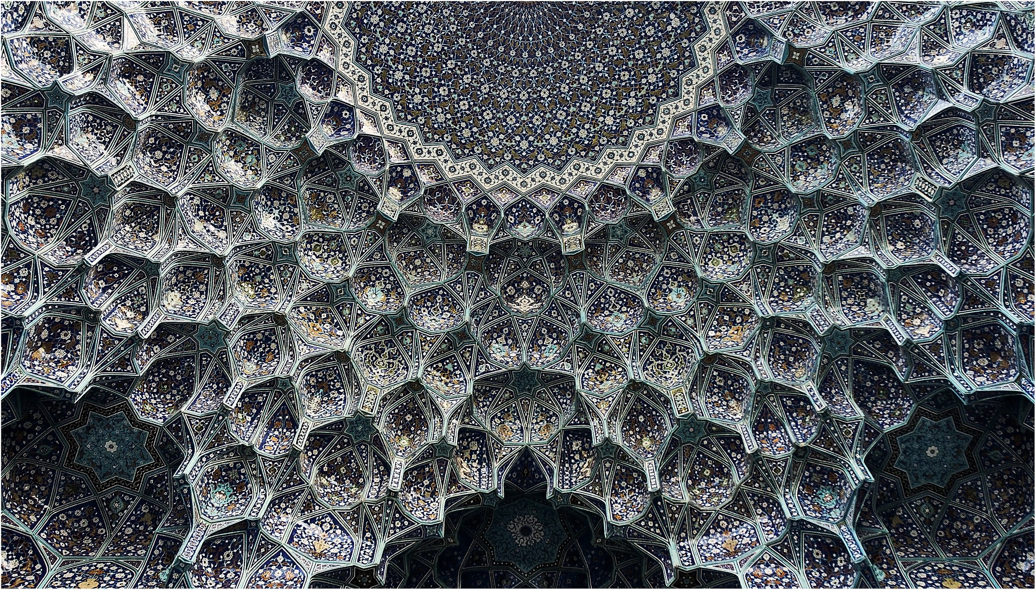 Intricate Islamic geometric tile patterns on a dome in Iran HD Wallpaper