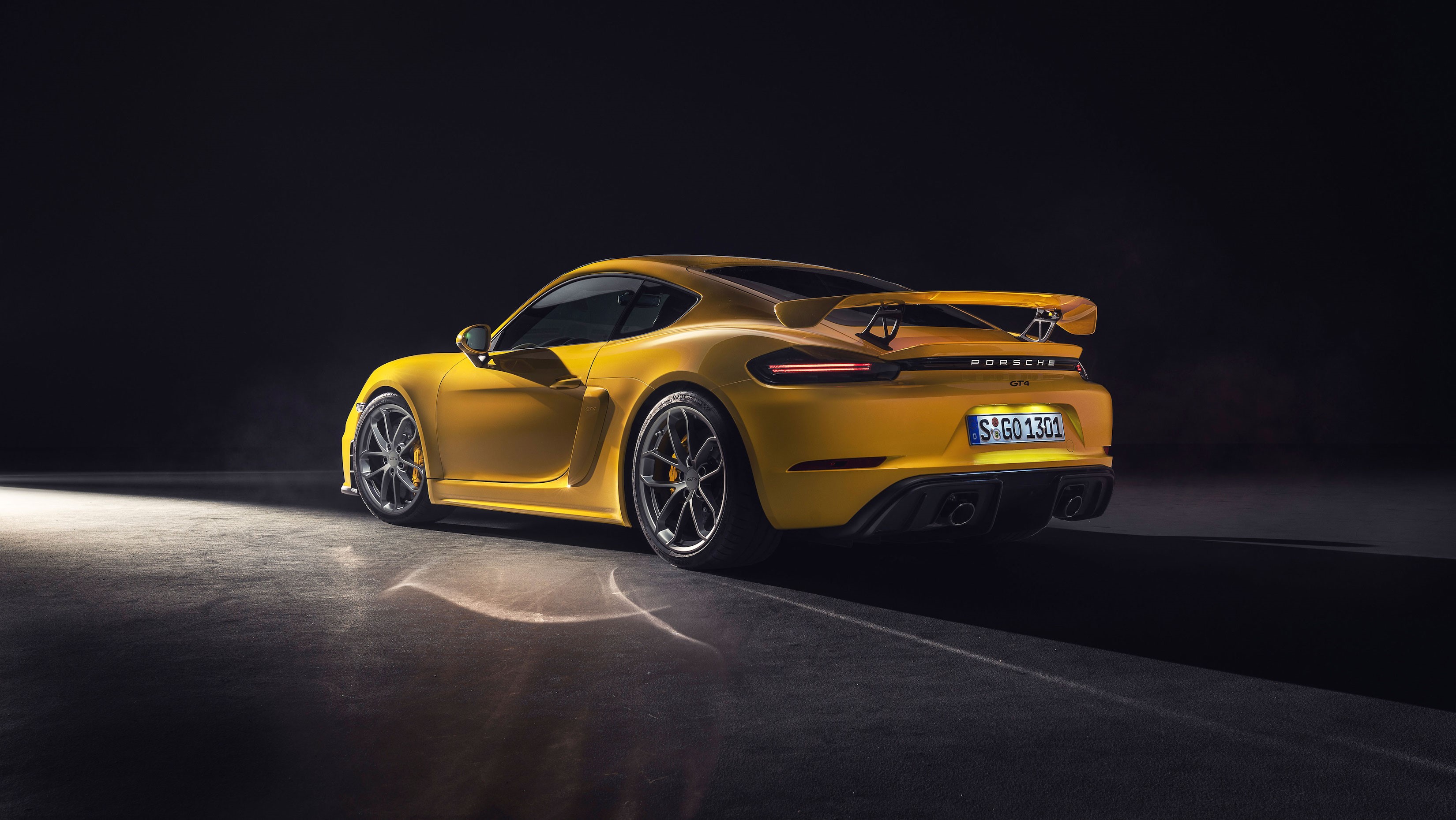 Yellow Porsche 718 Cayman GT4 RS sports car HD Wallpaper