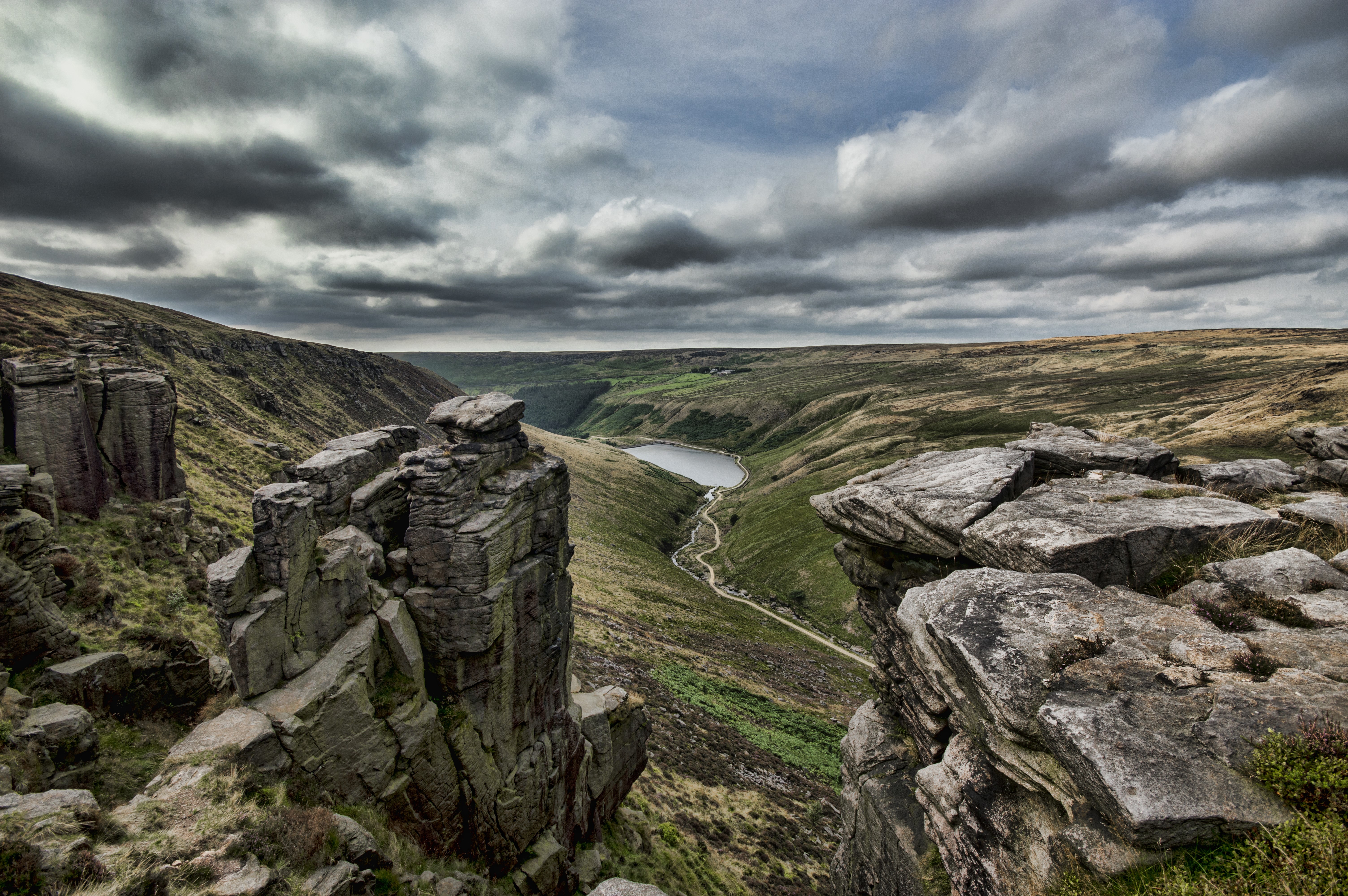 Rocky landscape with a lake and clouds HD Wallpaper