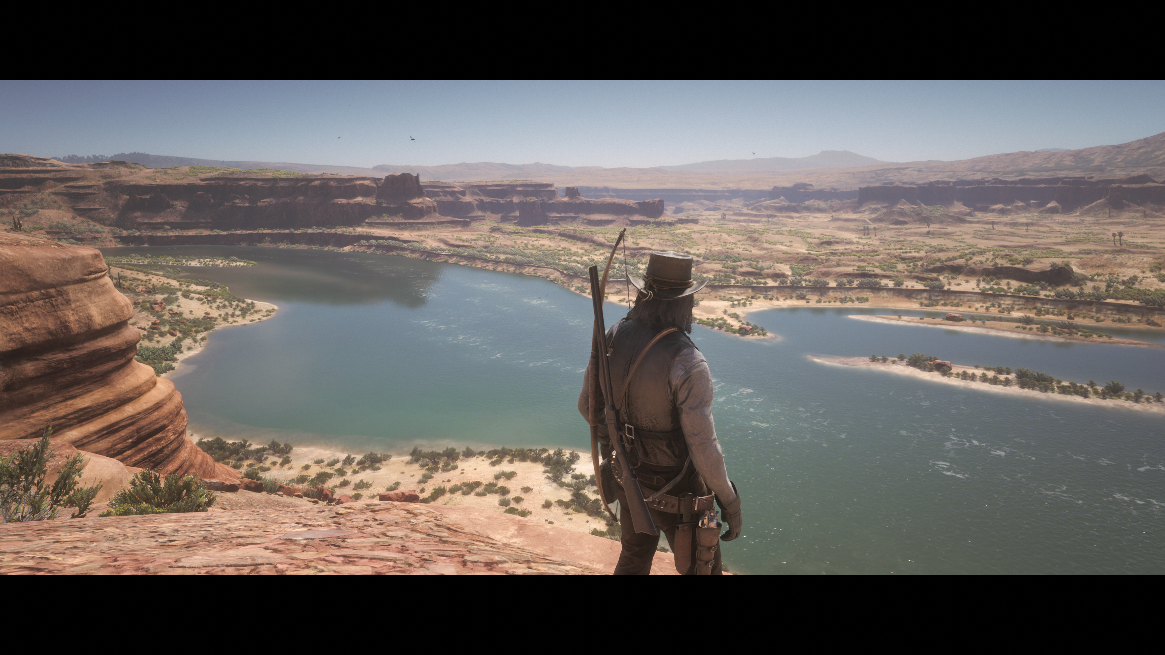 John Marston from Red Dead Redemption 2 overlooking a river HD Wallpaper