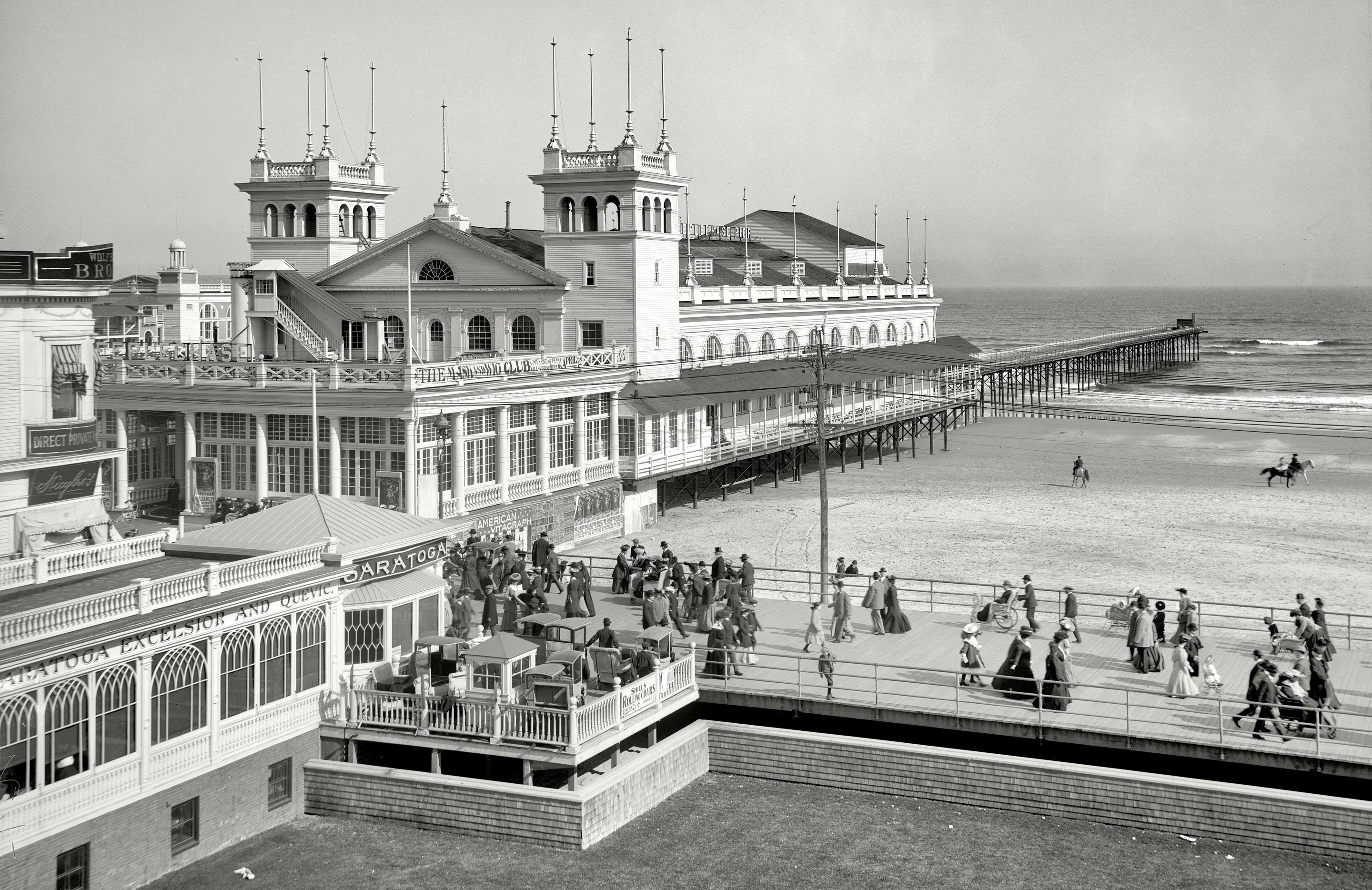 The Saratoga Club and Pier on a Beach HD Wallpaper