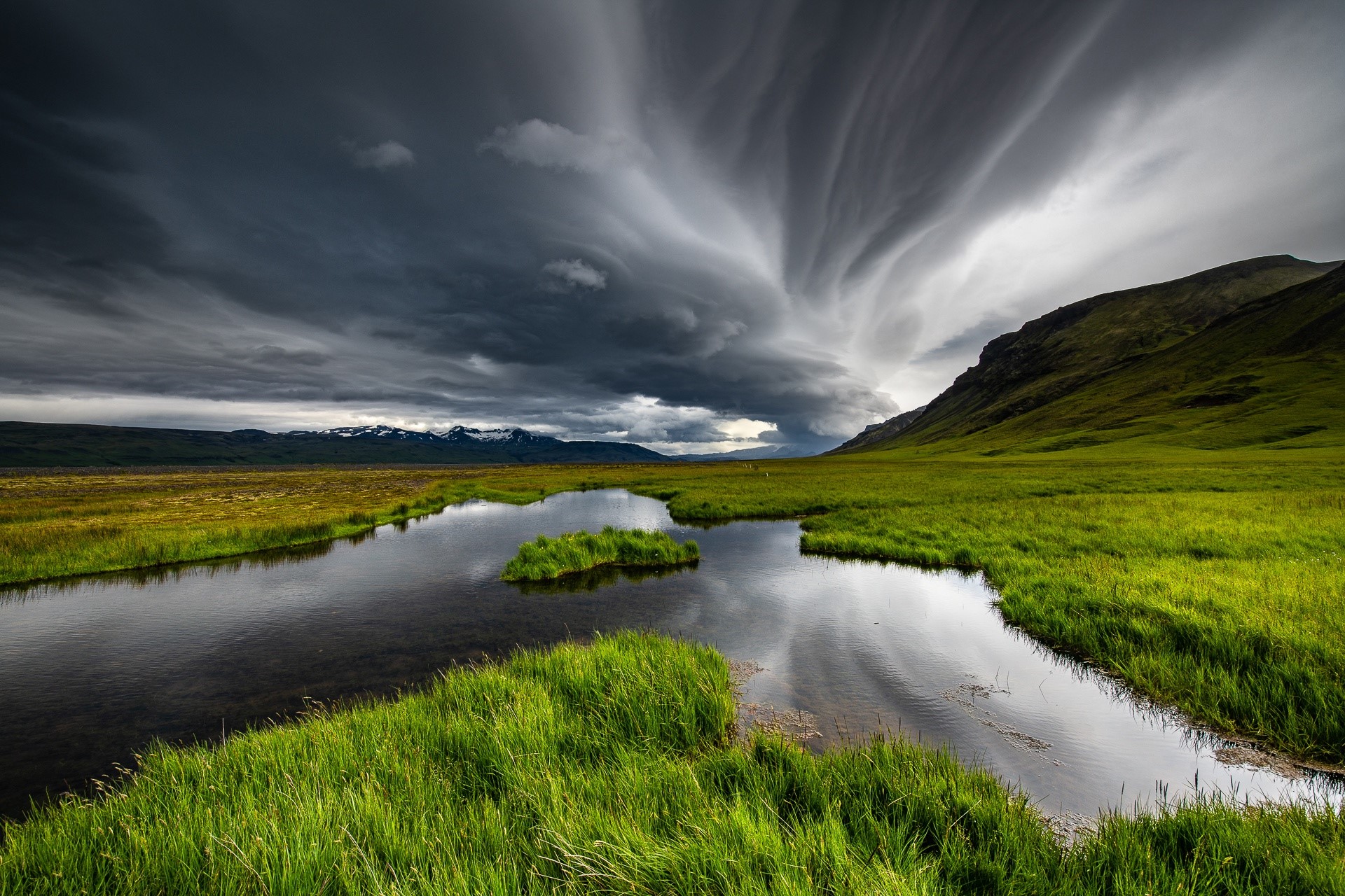 Stormy sky over a river and green landscape HD Wallpaper
