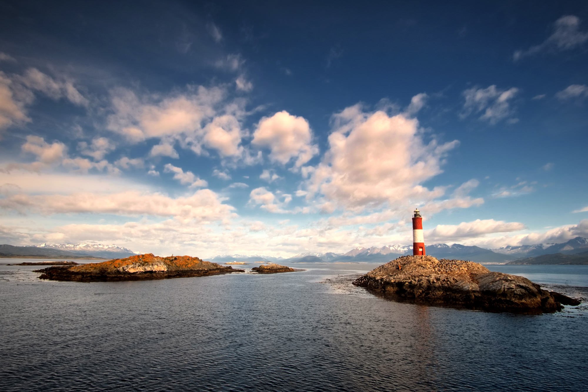 Lighthouse on a rocky island in Ushuaia, Patagonia HD Wallpaper