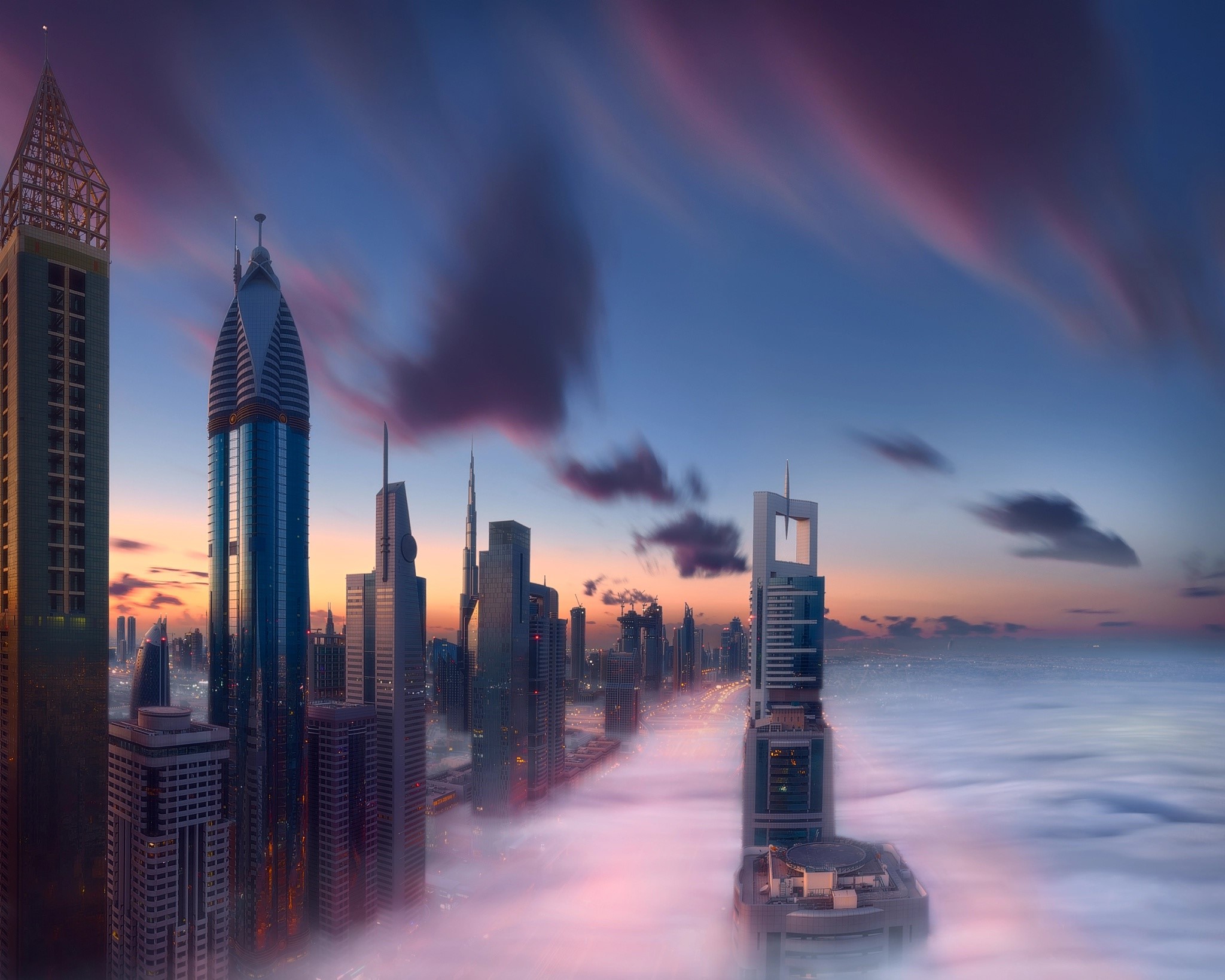 Dubai cityscape at sunrise with clouds HD Wallpaper