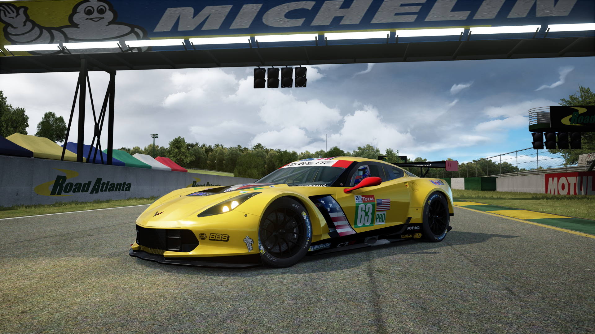 Yellow Chevrolet Corvette C7 Z06 race car at Road Atlanta HD Wallpaper