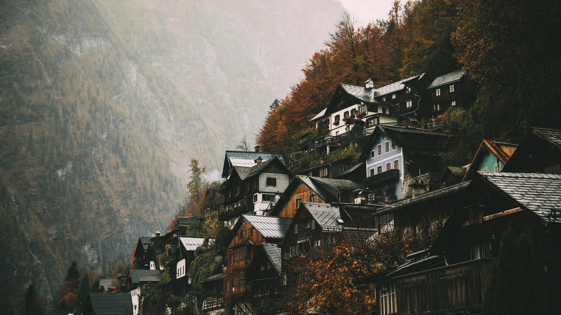 Hallstatt village nestled on a mountainside in Austria HD Wallpaper