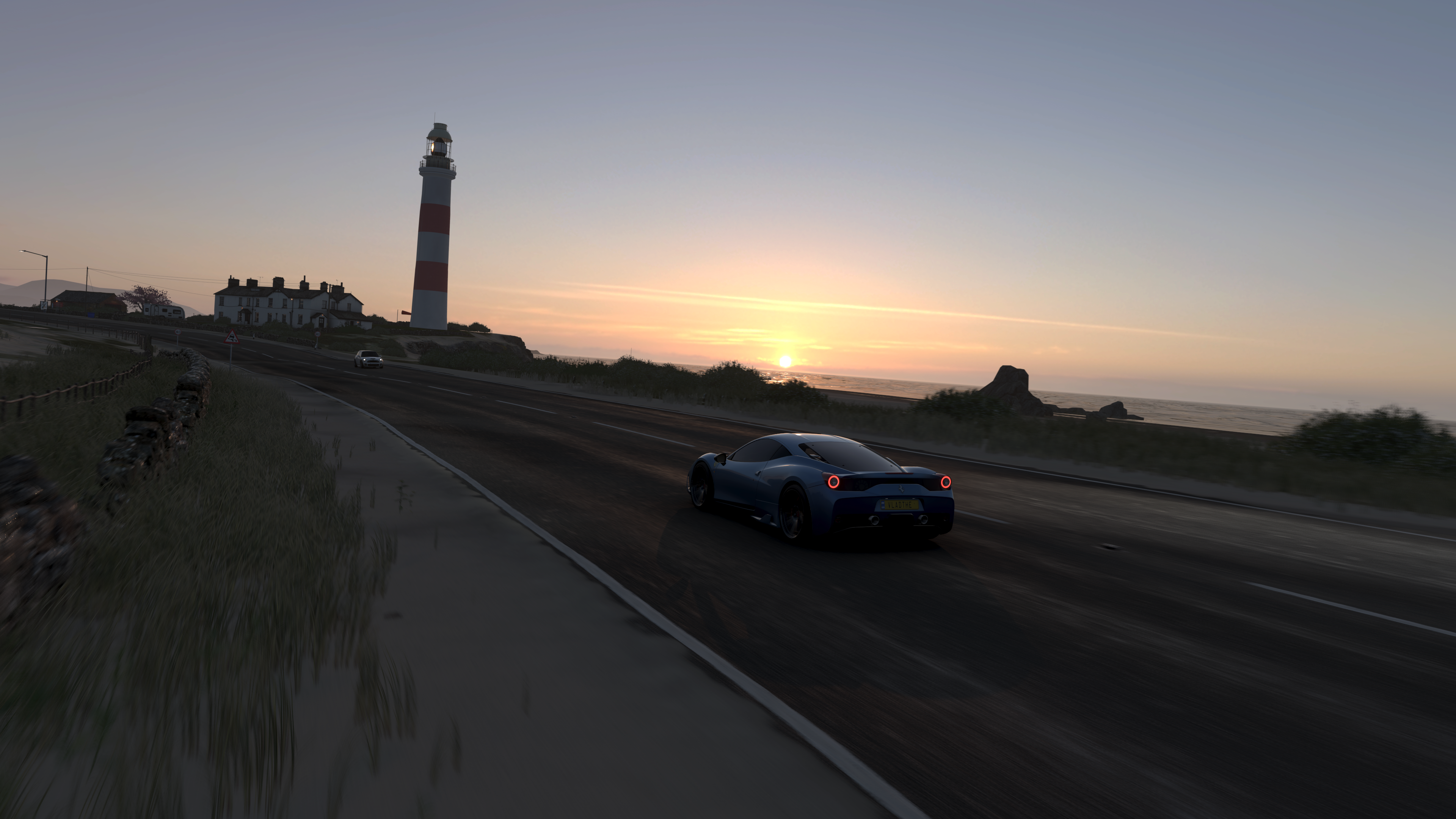 Forza Horizon 4 car driving by lighthouse at sunset HD Wallpaper